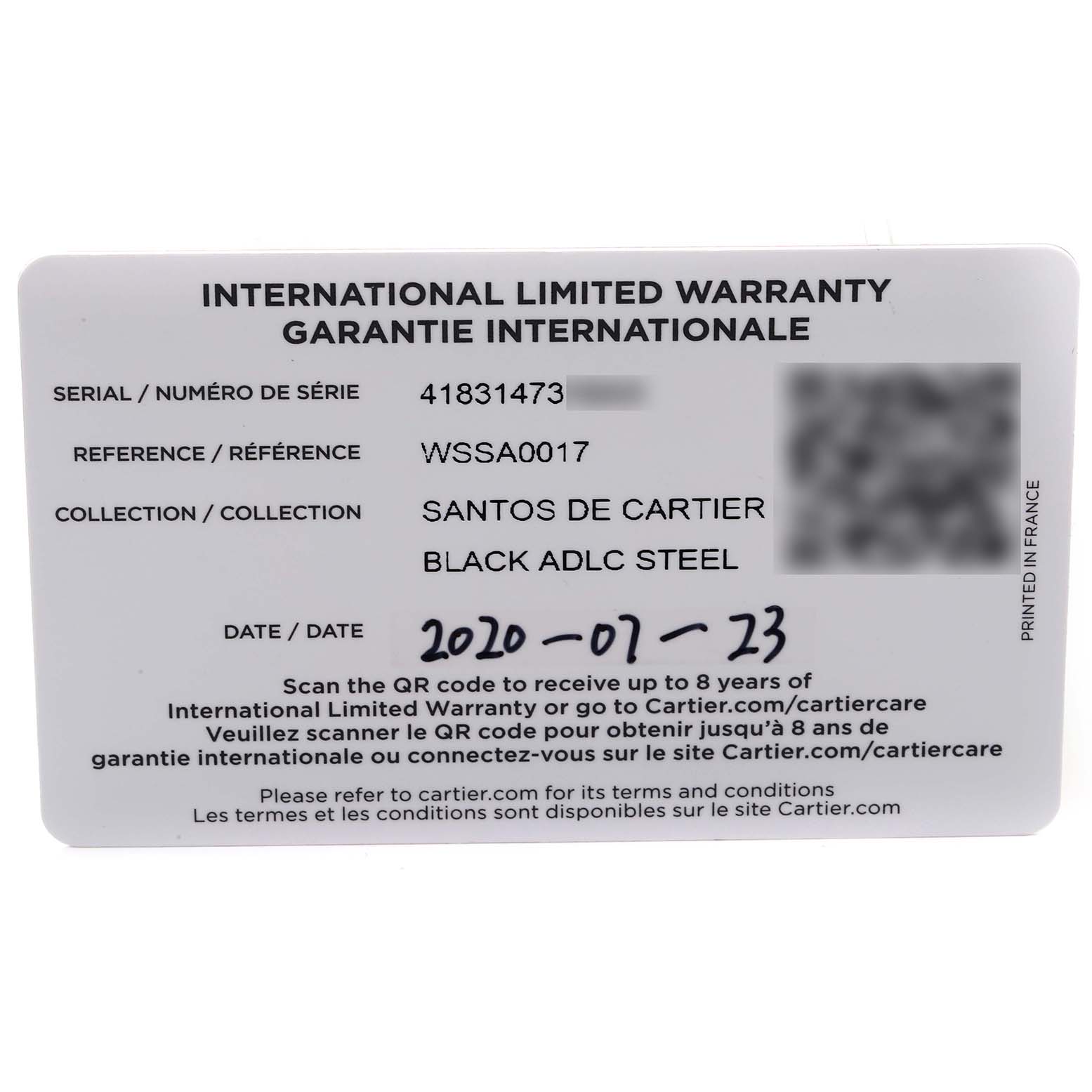 The image shows the International Limited Warranty card for the Santos de Cartier watch model made of Black ADLC Steel.