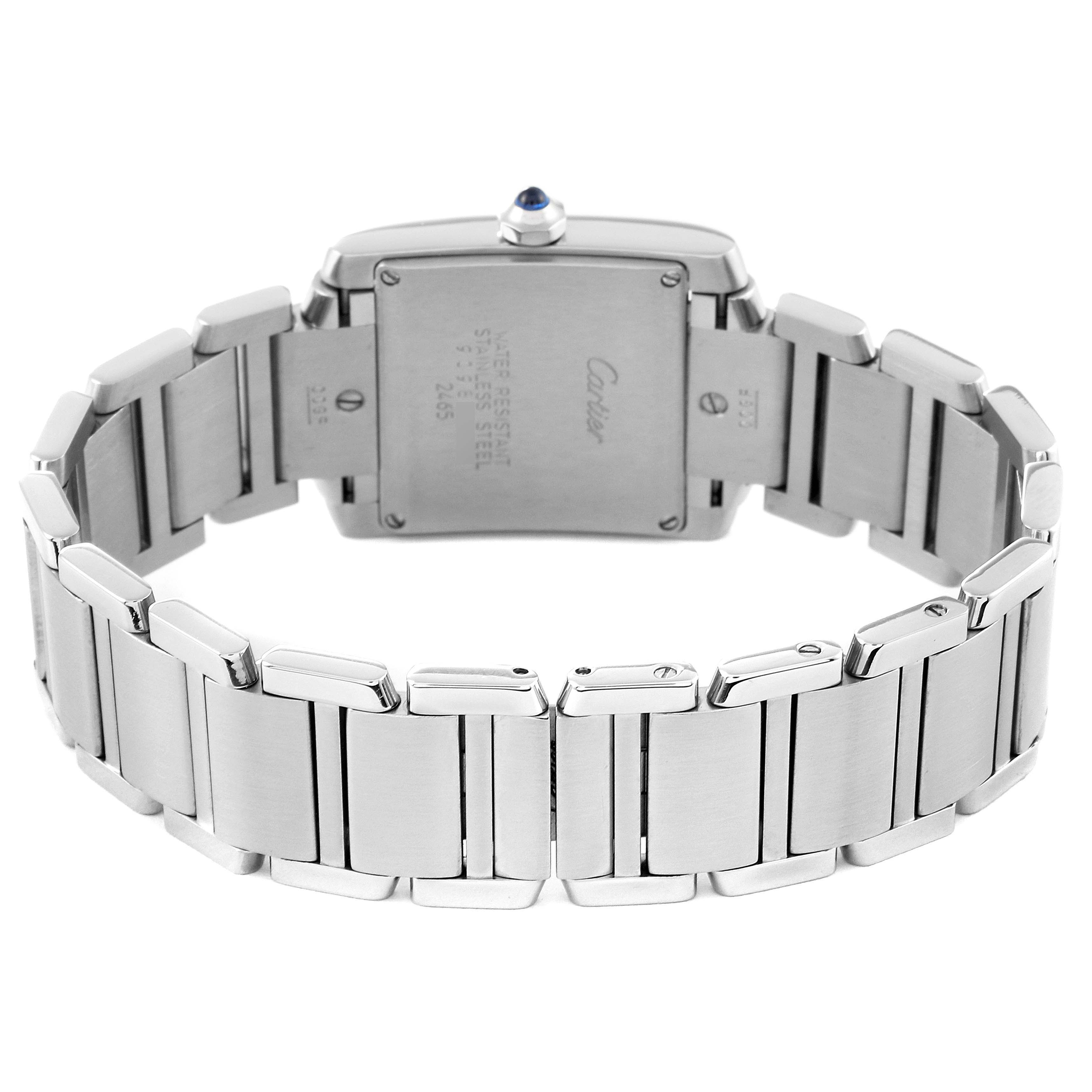 This image shows the back view of the Cartier Tank Française watch, highlighting its stainless steel case and bracelet.