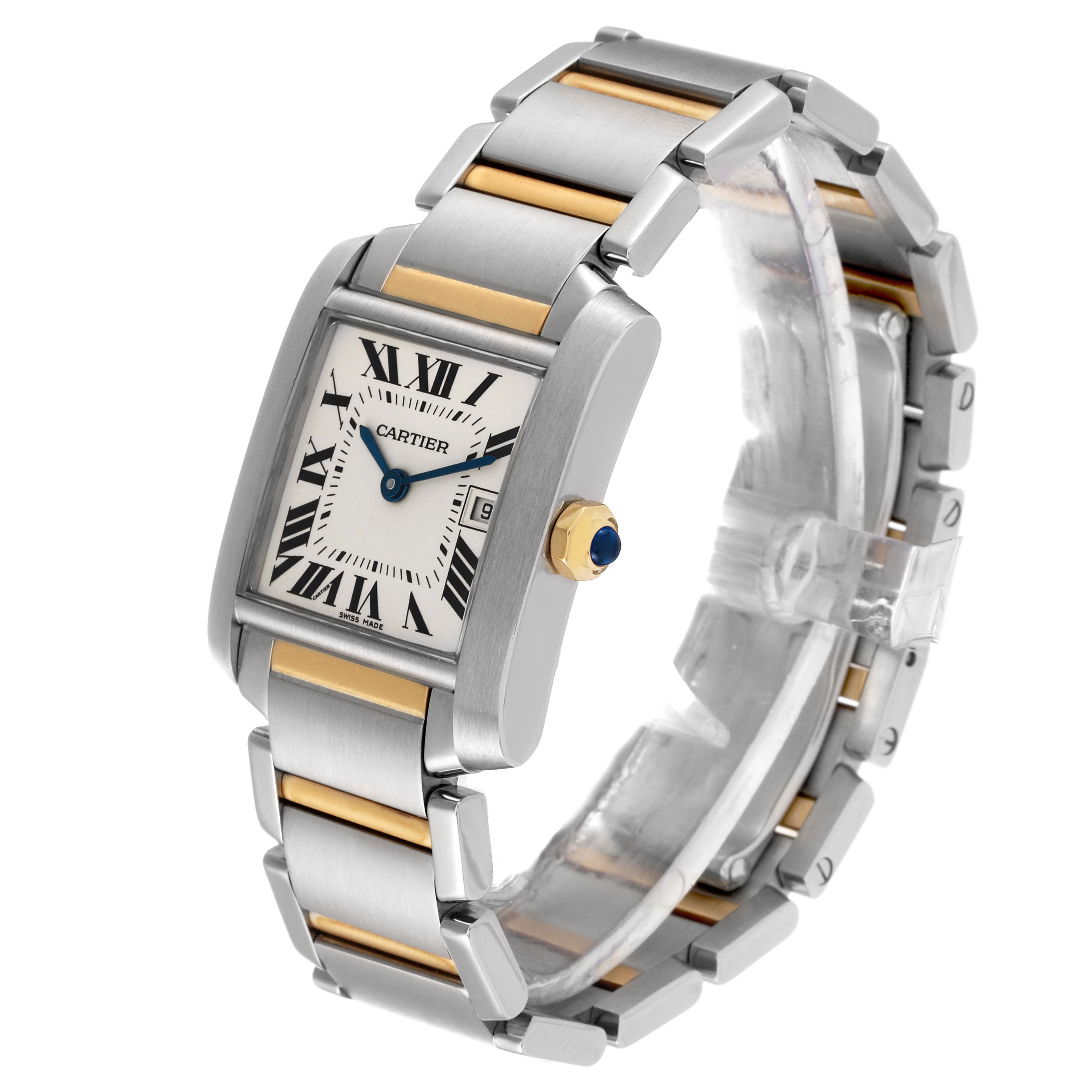 The Cartier Tank Francaise W51012Q4 Women's Steel and Gold (two tone) Silver Dial W51012Q4 Women's Steel and Gold (two tone) Silver Dial watch is shown at an angle highlighting its rectangular face, Roman numeral dial, metal band, and crown with a blue gemstone.