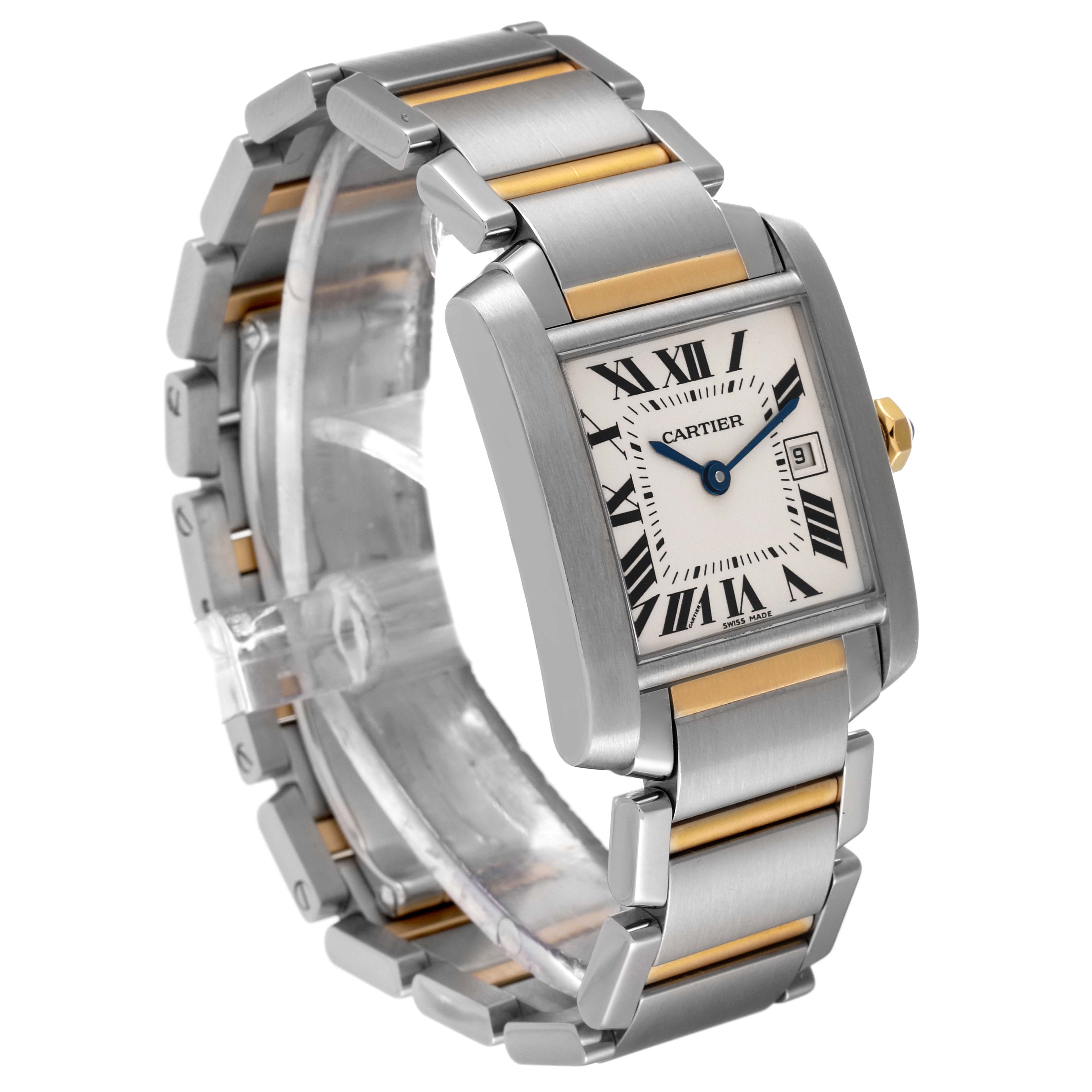 The Cartier Tank Française watch is shown at an angle displaying its rectangular face, metal bracelet, and Roman numeral dial.