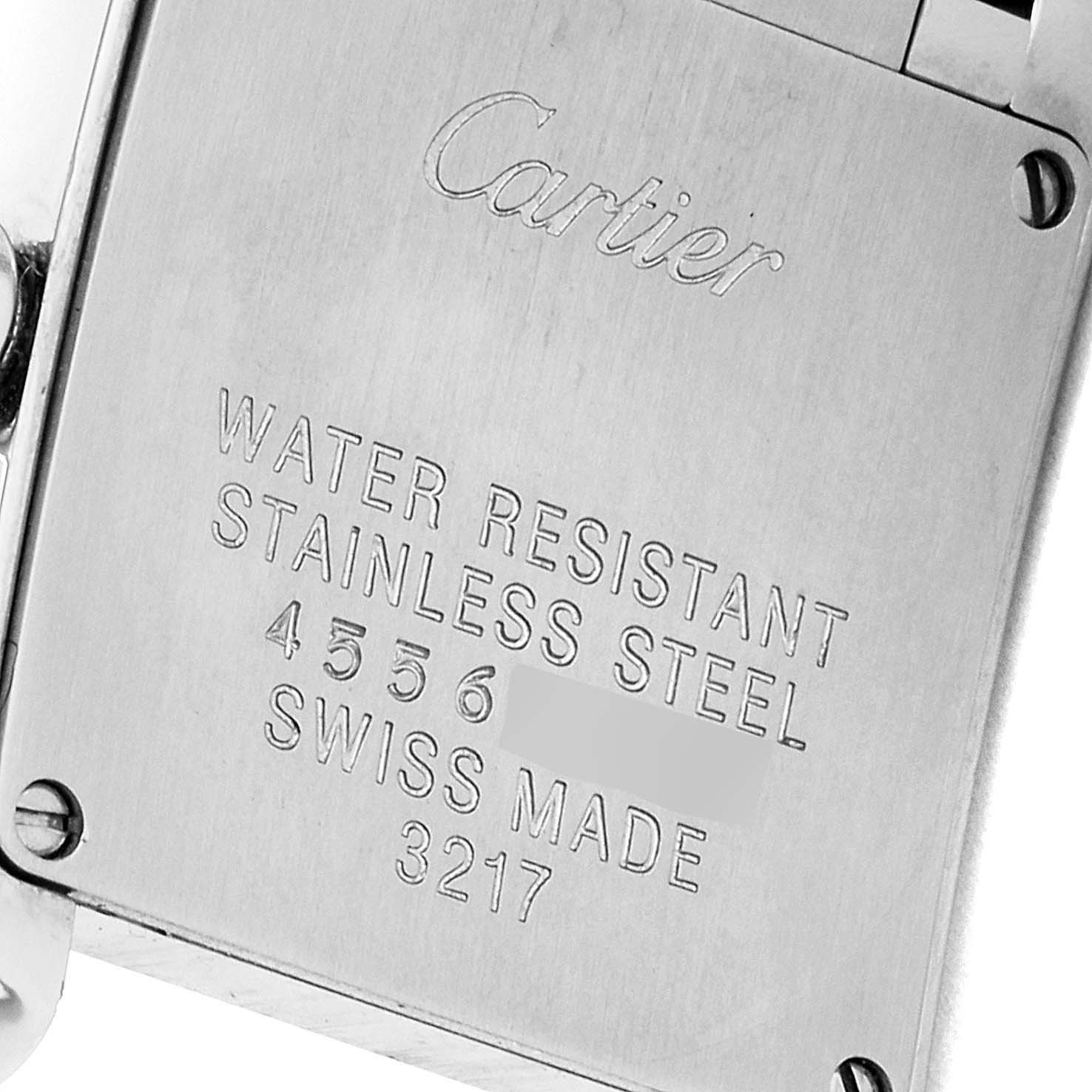 The image shows the back case of a Cartier Tank Francaise W4TA0008 Women's Stainless Steel Silver Dial W4TA0008 Women's Stainless Steel Silver Dial watch, highlighting the brand’s engraving and specifications.