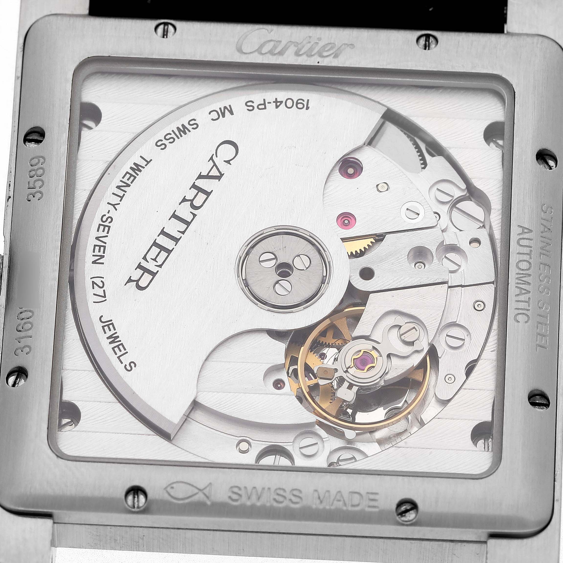 The image shows the back view of a Cartier Tank MC W5330004 Men's Stainless Steel Black Dial watch, revealing its automatic movement and internal mechanisms.
