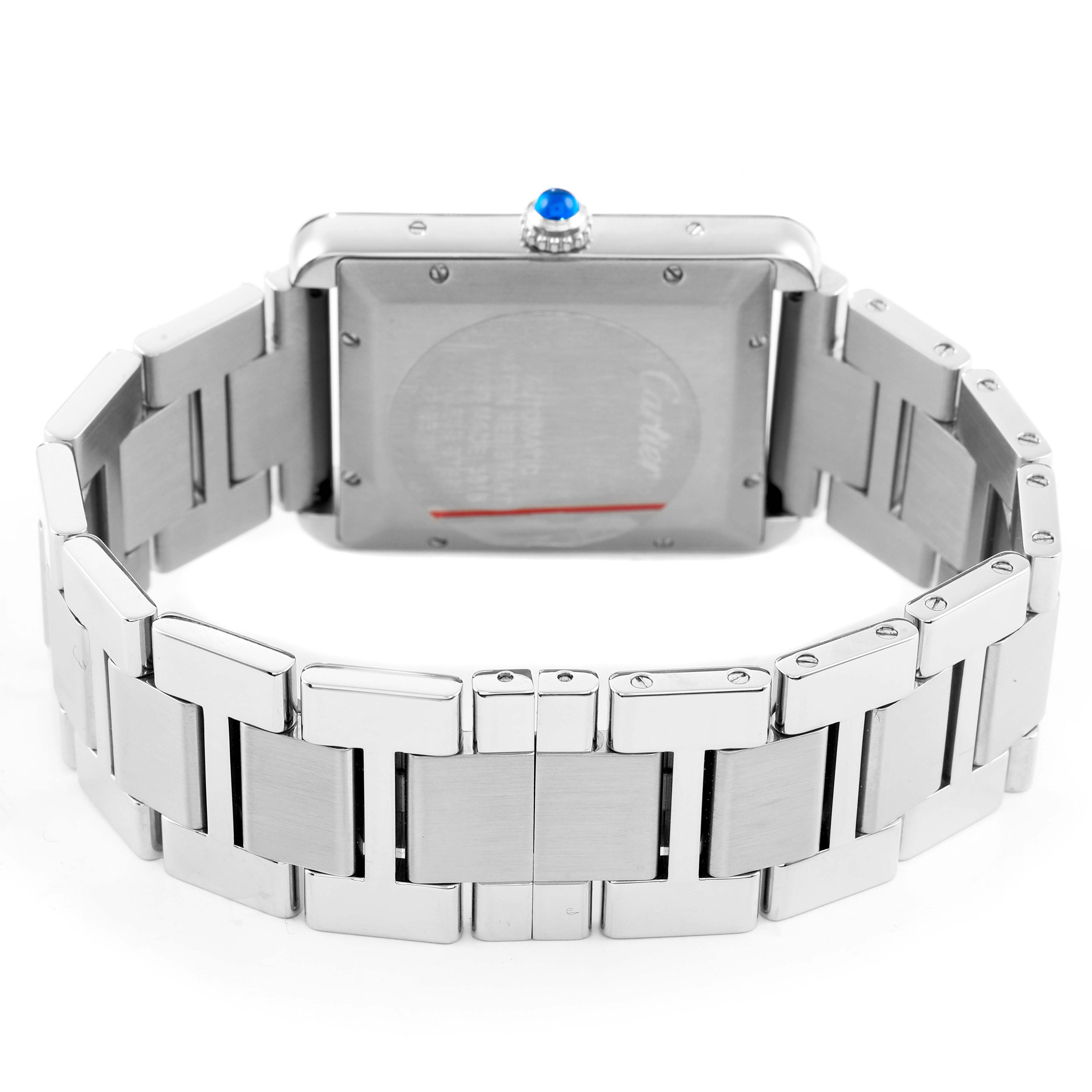 The image shows the back case and bracelet of a Cartier Tank Solo W5200028 Men's Stainless Steel Silver Dial watch from a slightly elevated angle.