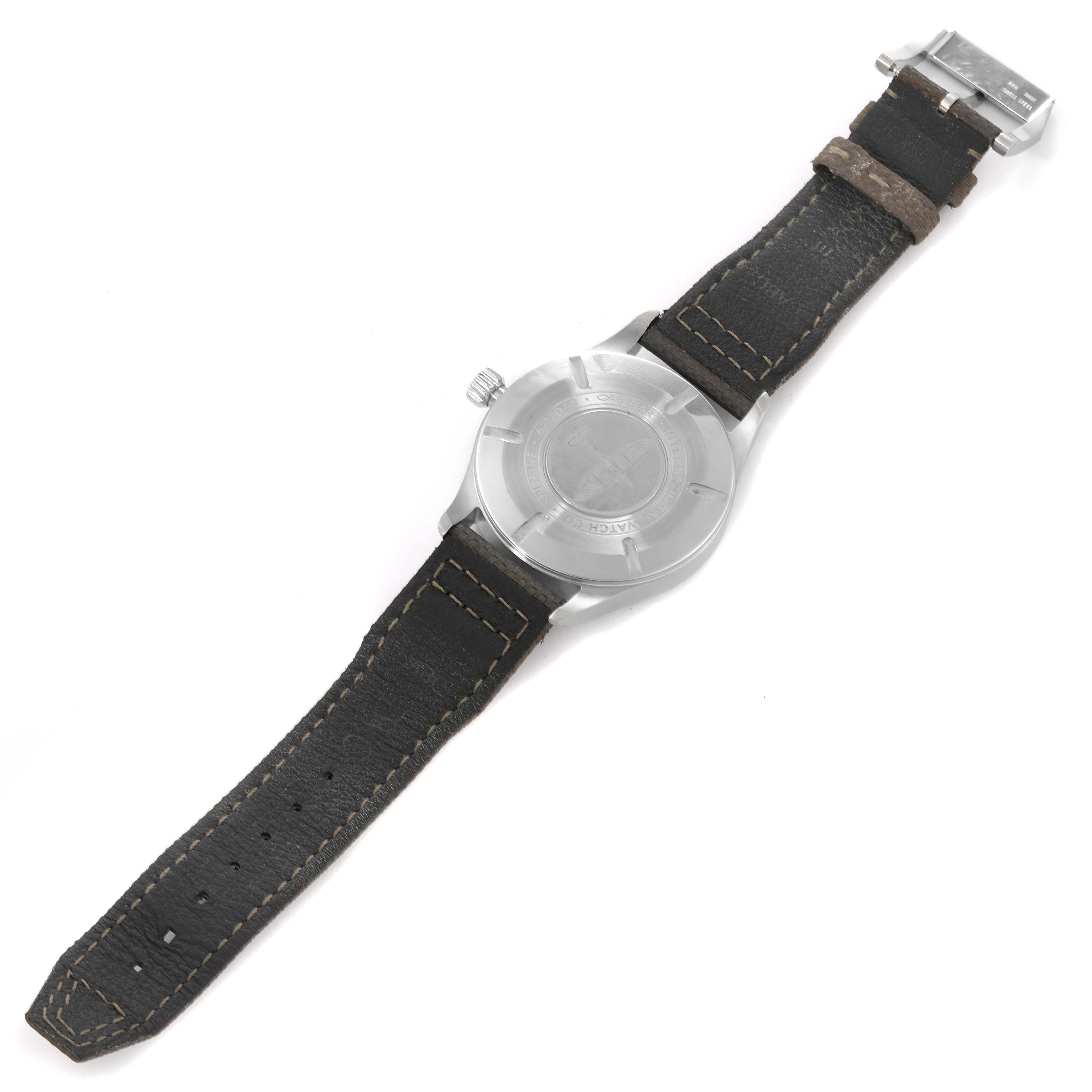 The image shows the back view of an IWC Pilot IW326801 Men's Stainless Steel Black Dial IW326801 Men's Stainless Steel Black Dial model watch, highlighting the case back and leather strap.