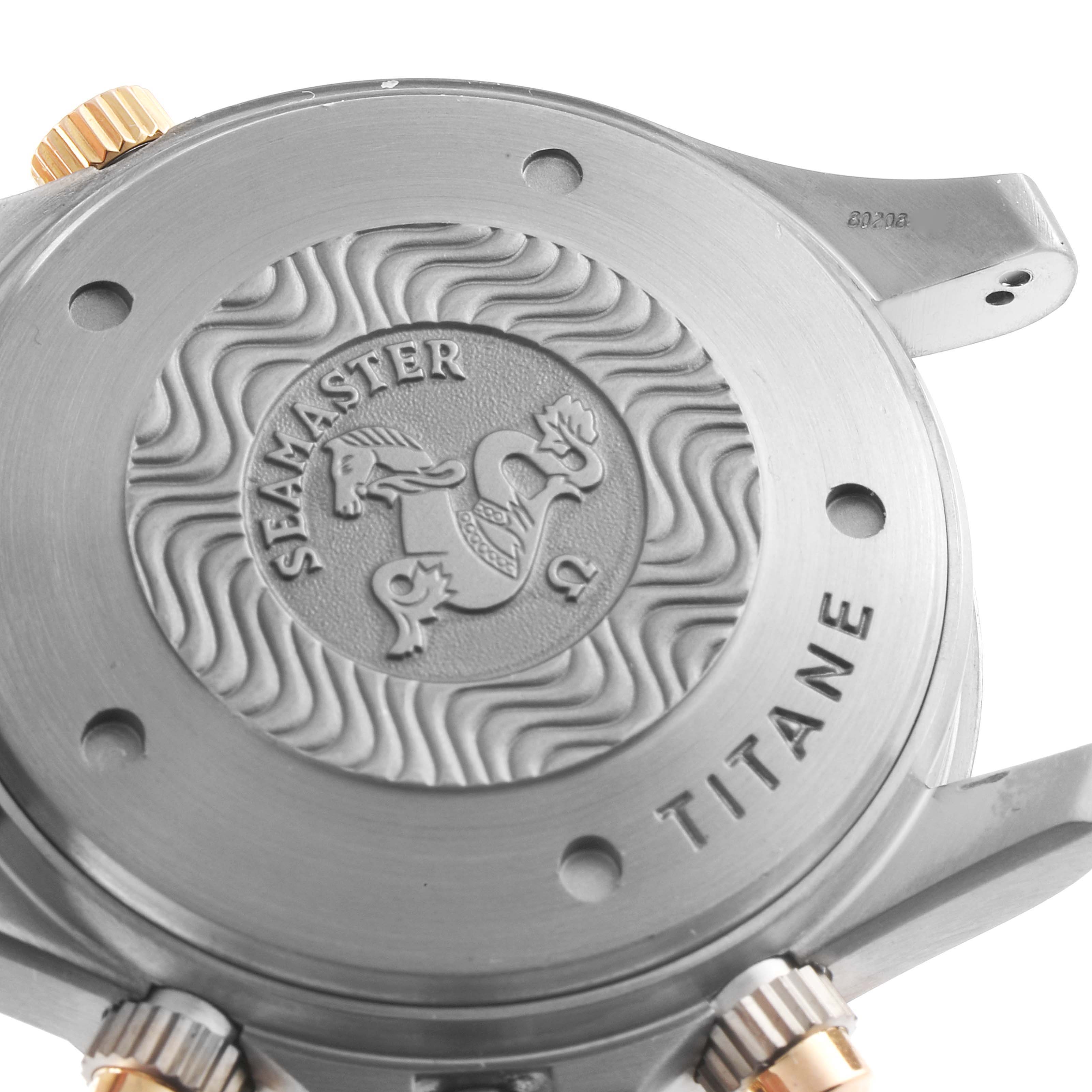 The image shows the back case of an Omega Seamaster 2296.80.00 Men's Steel and Gold (two tone) Blue Dial 2296.80.00 Men's Steel and Gold (two tone) Blue Dial watch, displaying the logo, "SEAMASTER," and "TITANE" engraved.