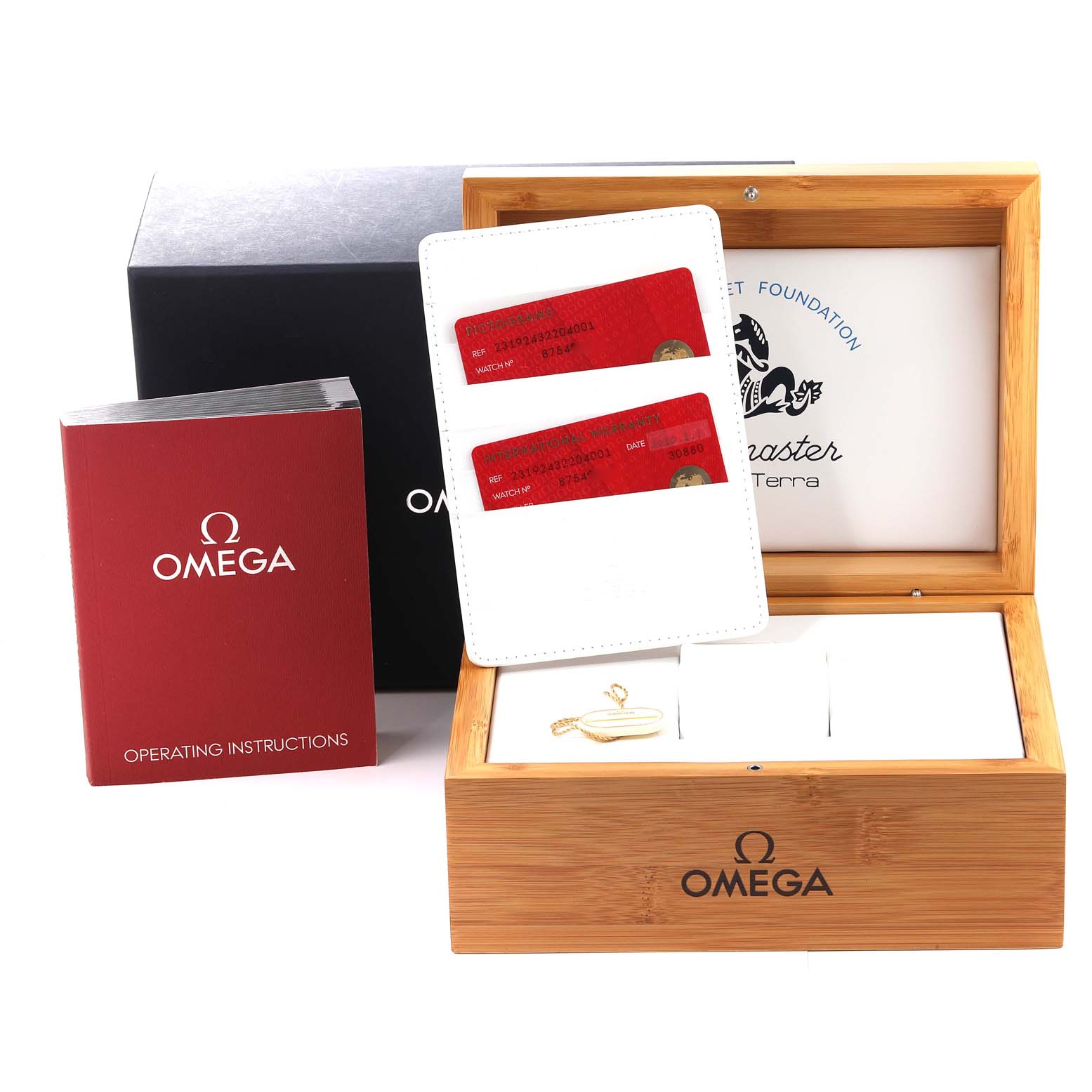 The image shows the packaging, warranty cards, and operation manual for the Omega Aqua Terra 231.92.43.22.04.001 Men's Titanium White Dial 231.92.43.22.04.001 Men's Titanium White Dial watch model.