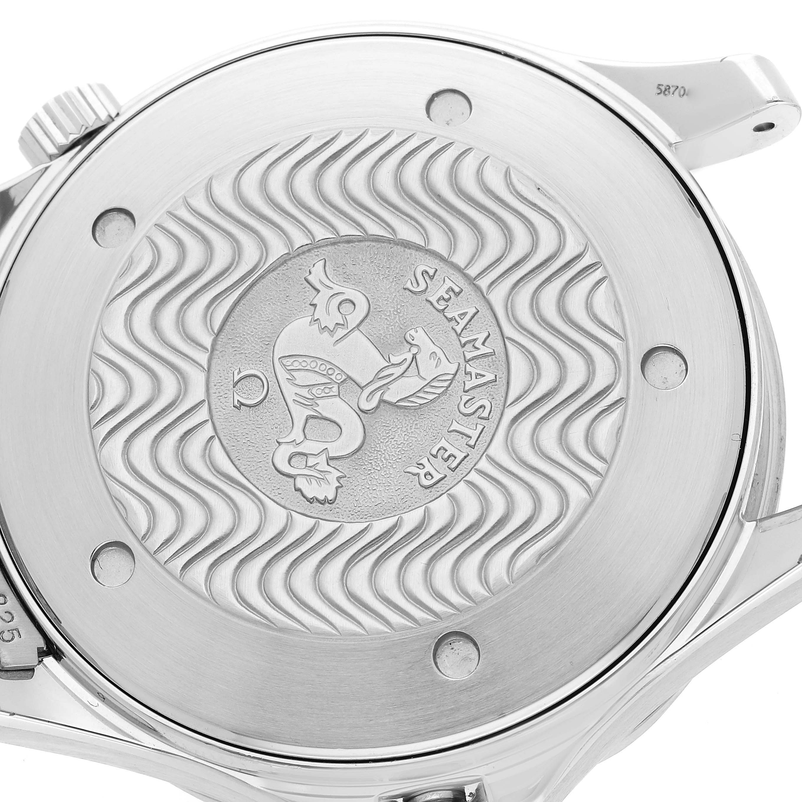 This image shows a close-up of the case back of an Omega Seamaster 2541.80.00 Men
s Stainless Steel Blue Dial 2541.80.00 Men
s Stainless Steel Blue Dial watch, featuring an engraved logo and wave pattern design.