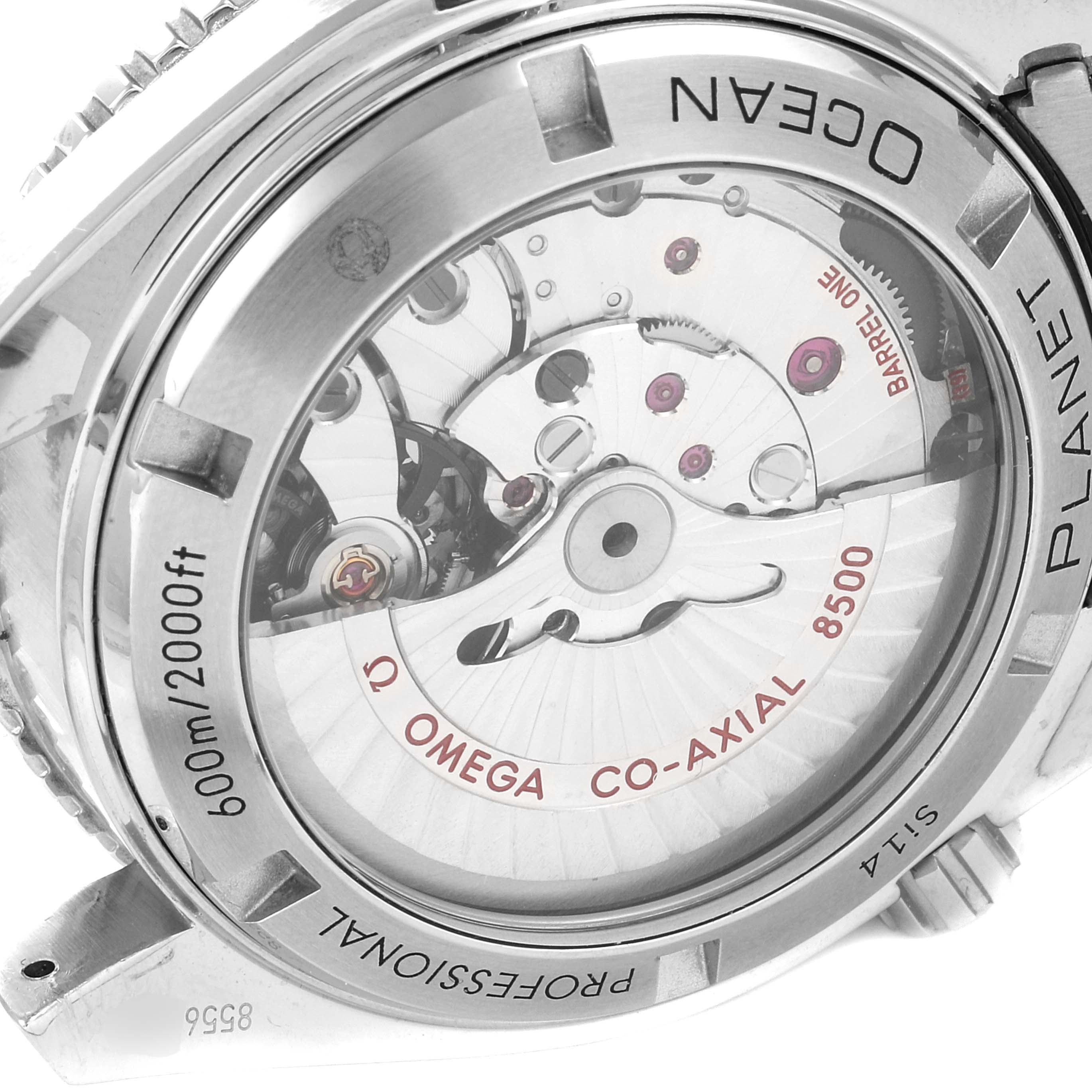 The image shows the case back of an Omega Planet Ocean 232.30.42.21.04.001 Men's Stainless Steel White Dial 232.30.42.21.04.001 Men's Stainless Steel White Dial watch, revealing the movement inside.