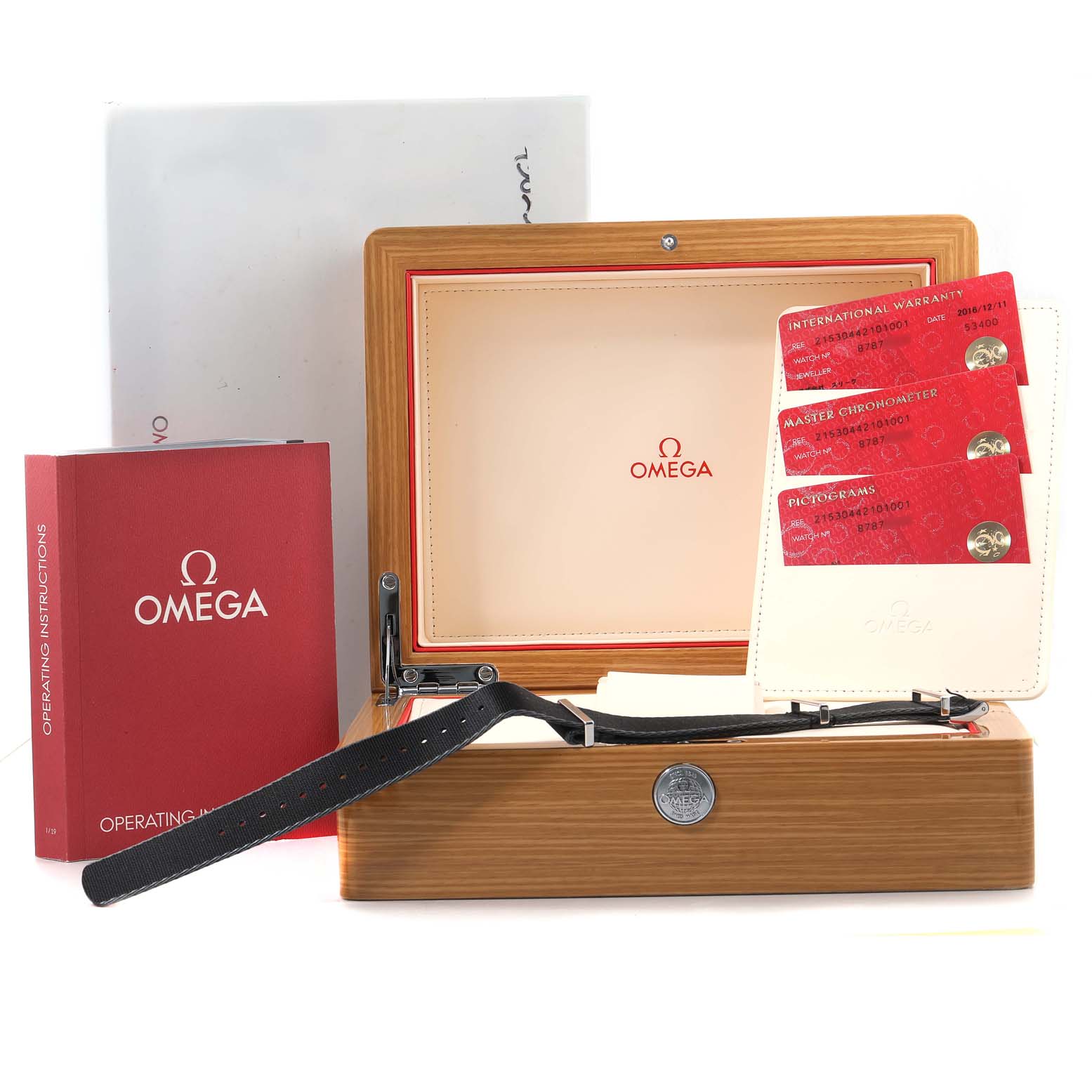 The image shows an Omega Planet Ocean 215.30.44.21.01.001 Men's Stainless Steel Black Dial 215.30.44.21.01.001 Men's Stainless Steel Black Dial watch in its box, accompanied by warranty cards and an operating instruction booklet.