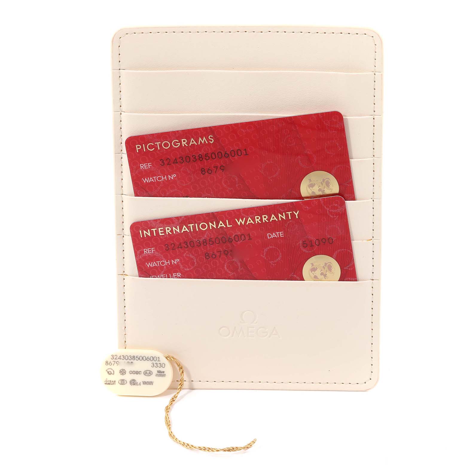 The image shows the warranty card holder with cards and a tag for the Omega Speedmaster 324.30.38.50.06.001 Men's Stainless Steel Grey Dial 324.30.38.50.06.001 Men's Stainless Steel Grey Dial watch.