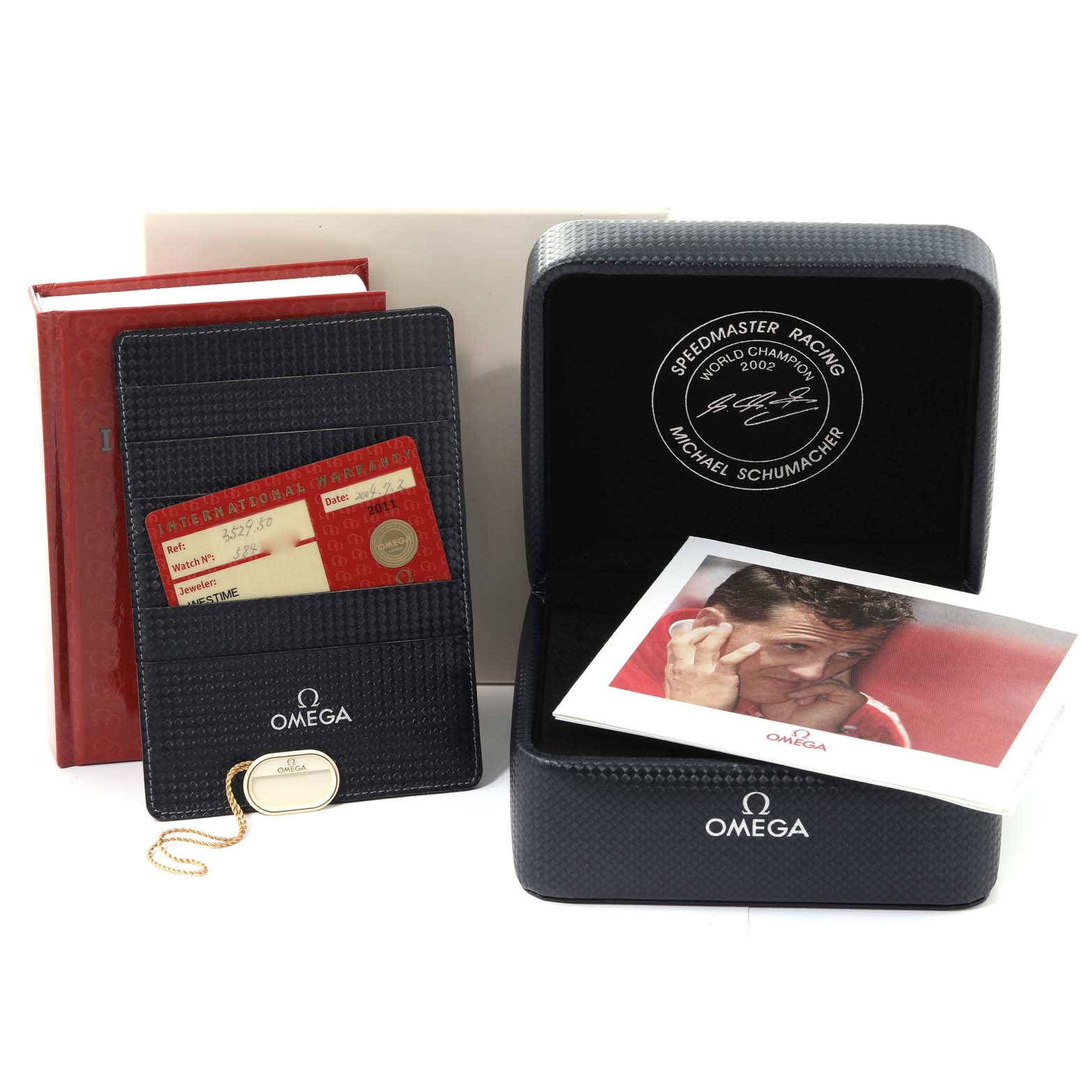 The image shows an Omega Speedmaster 3529.50.00 Men's Stainless Steel Black Dial 3529.50.00 Men's Stainless Steel Black Dial watch box, warranty cards, booklet, and a lanyard/accessory on a product information card.