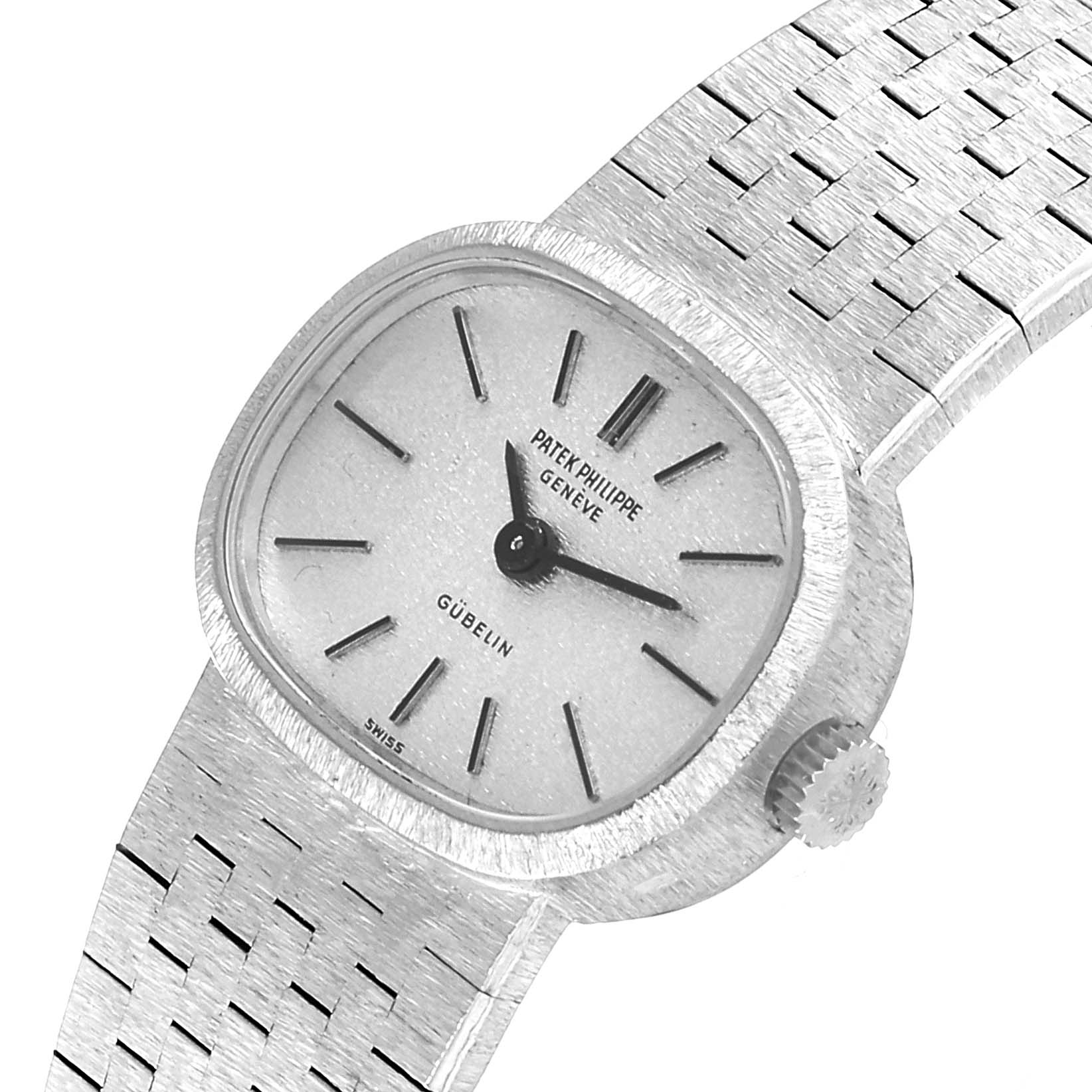 The image shows a top-down view of a Vintage Patek Philippe watch, displaying the face, bezel, and bracelet.