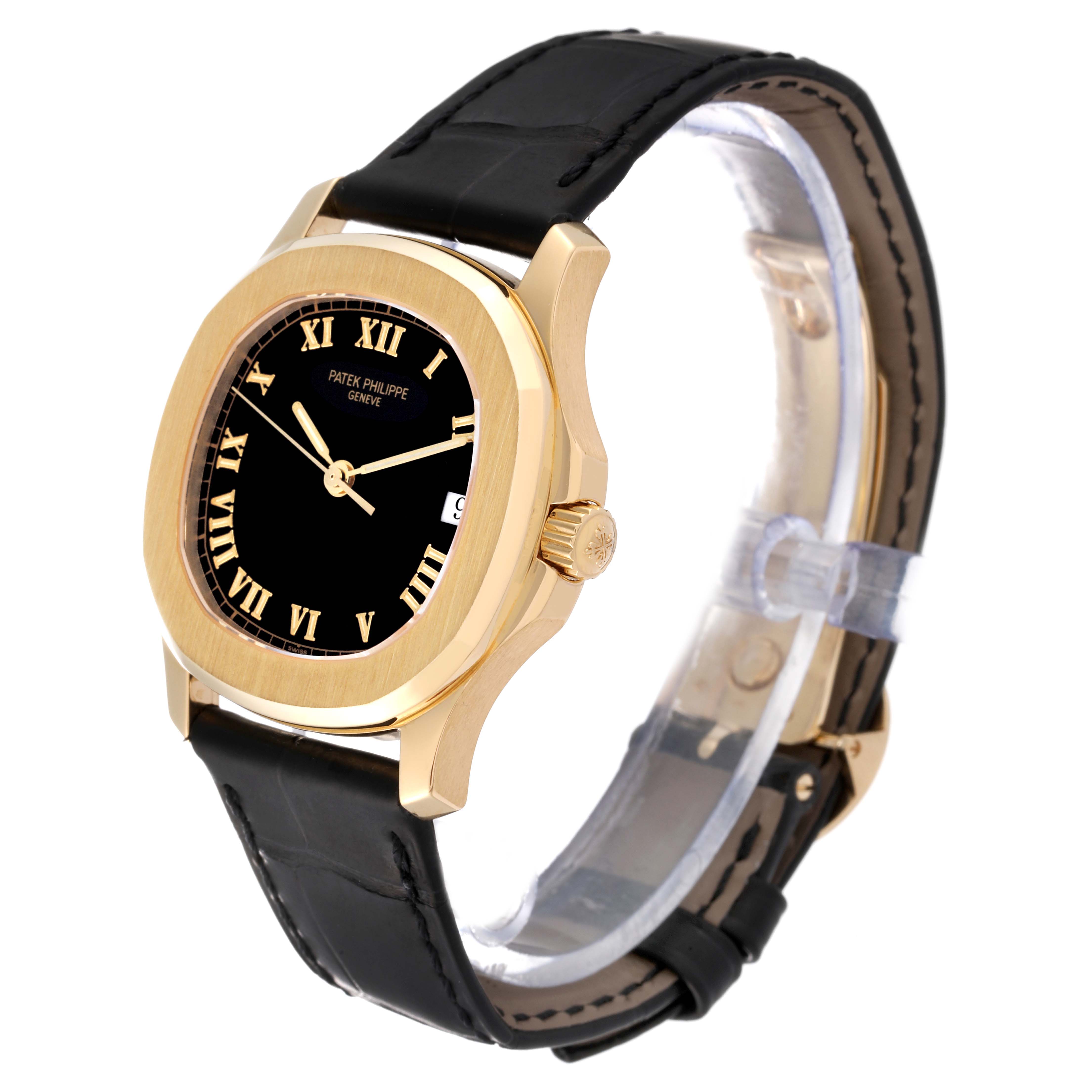 The image shows a side and front angle of a Patek Philippe Aquanaut 5060J Men's Yellow Gold Black Dial 5060J Men's Yellow Gold Black Dial watch with a black dial and black leather strap.