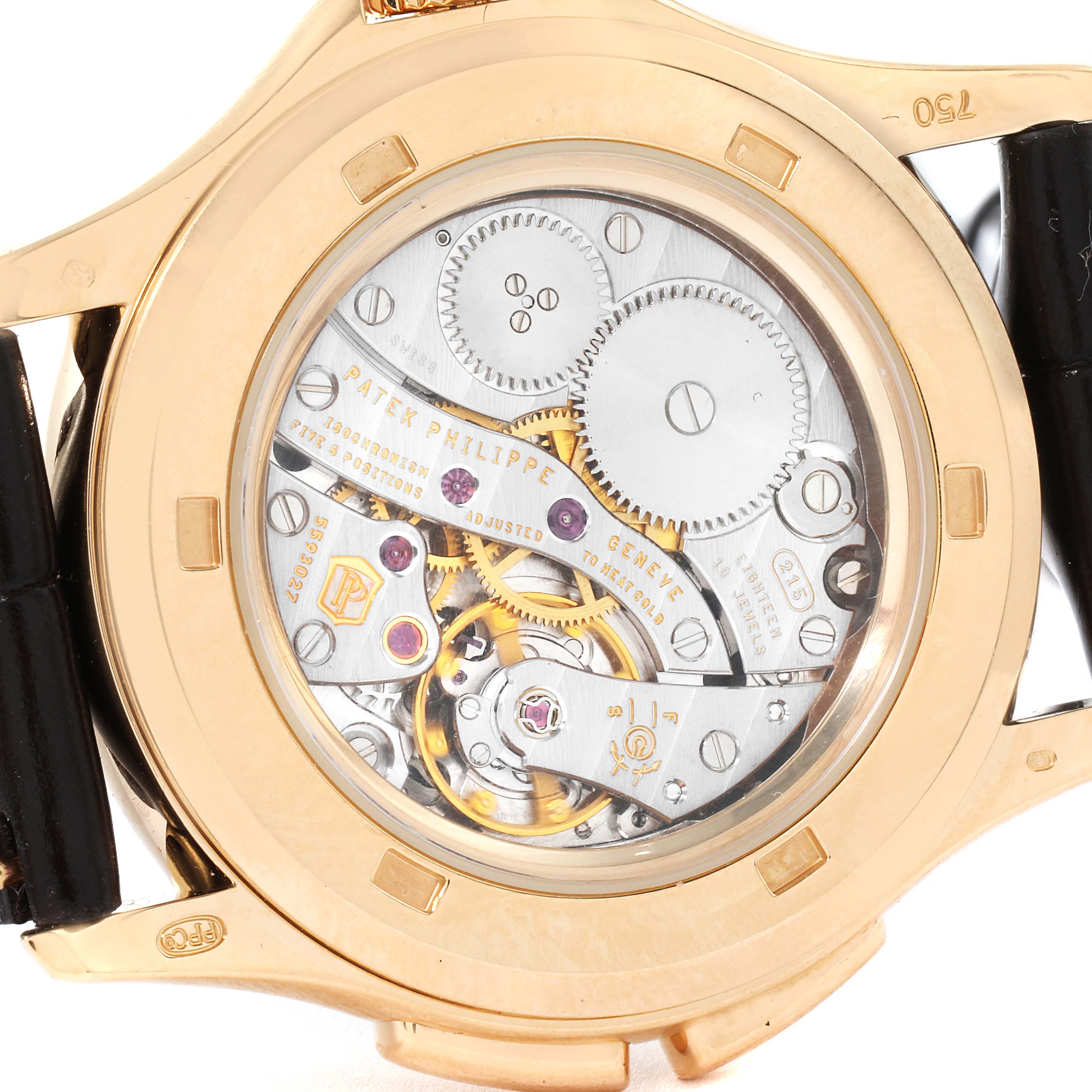 The image shows the back view of the Patek Philippe Calatrava 4934R Women's Rose Gold Mother of Pearl Dial 4934R Women's Rose Gold Mother of Pearl Dial, displaying its intricate mechanical movement.