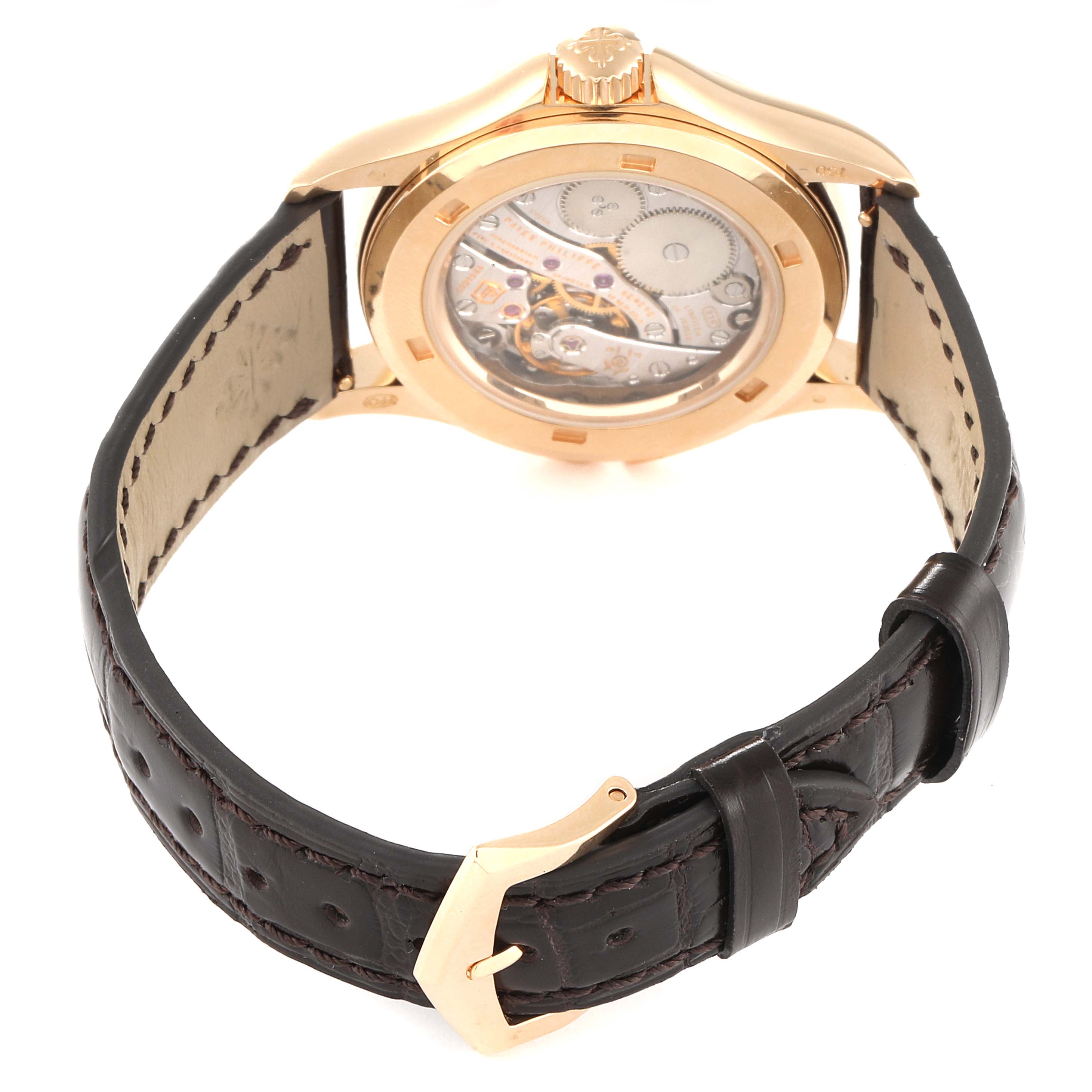 This image shows the back view of a Patek Philippe Calatrava 4934R Women's Rose Gold Mother of Pearl Dial 4934R Women's Rose Gold Mother of Pearl Dial watch, highlighting its open case back and black leather strap.