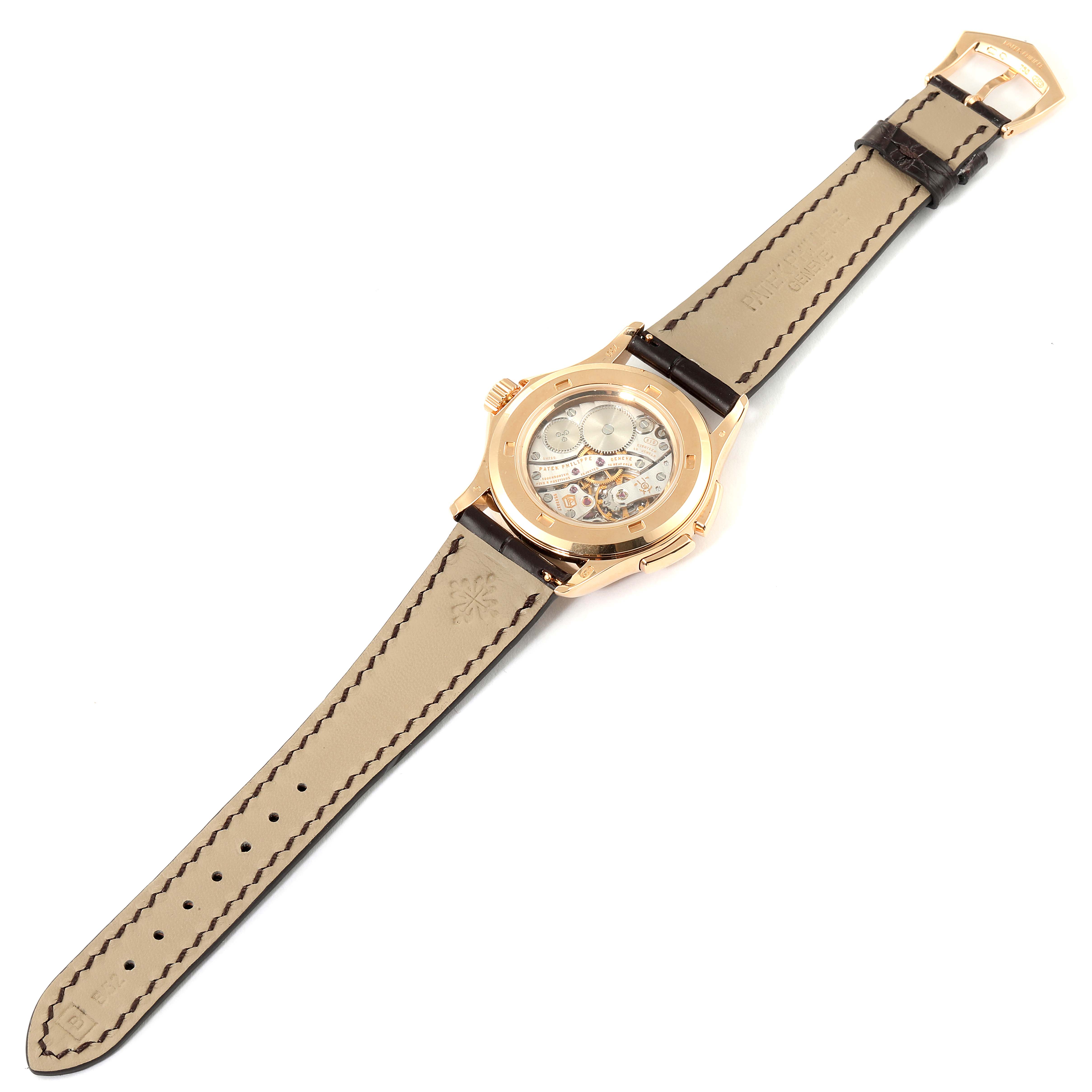 The image shows the back view of a Patek Philippe Calatrava 4934R Women's Rose Gold Mother of Pearl Dial 4934R Women's Rose Gold Mother of Pearl Dial watch, highlighting its leather strap and visible movement mechanism.