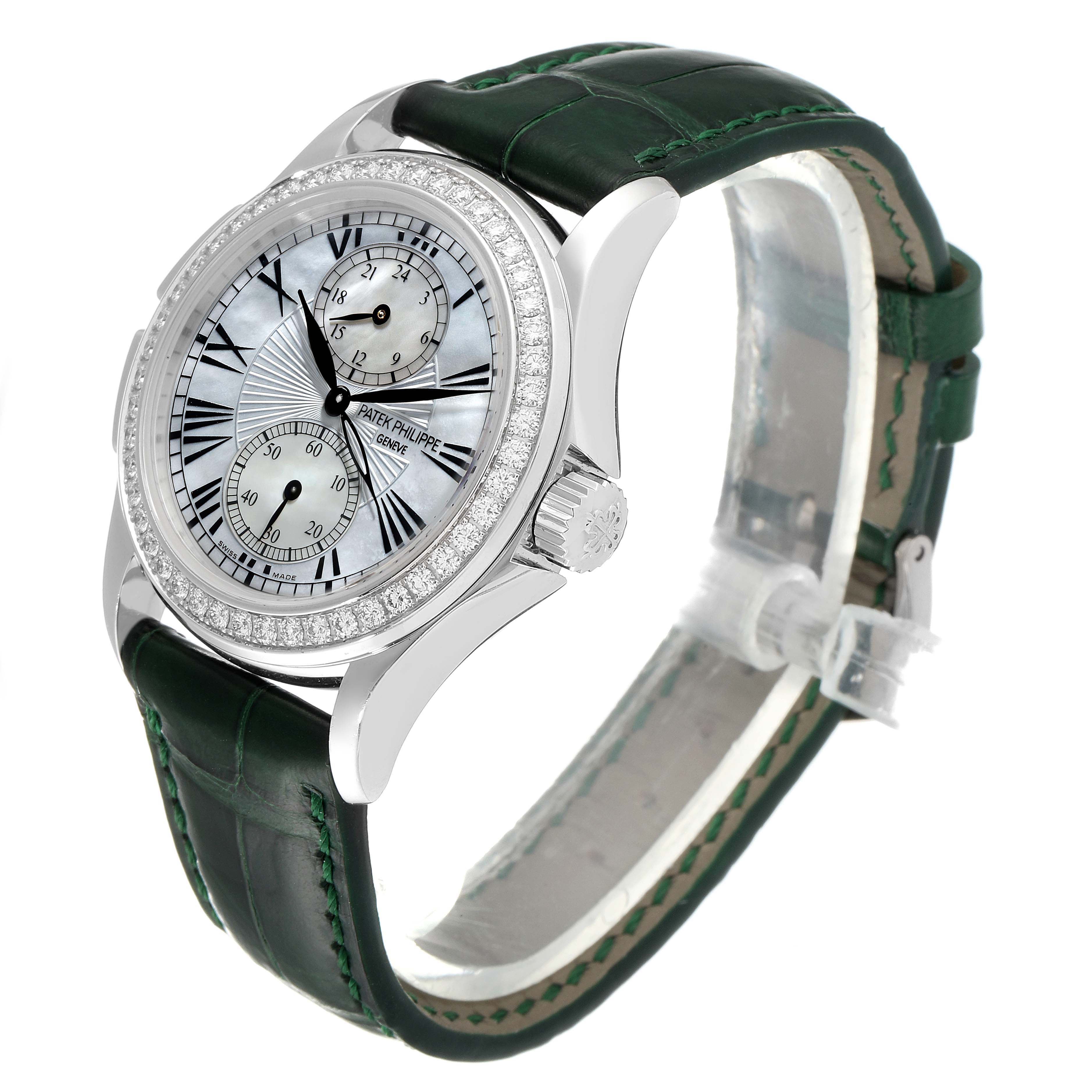 The Calatrava model by Patek Philippe is shown at an angle highlighting the dial, case, bezel, and strap.