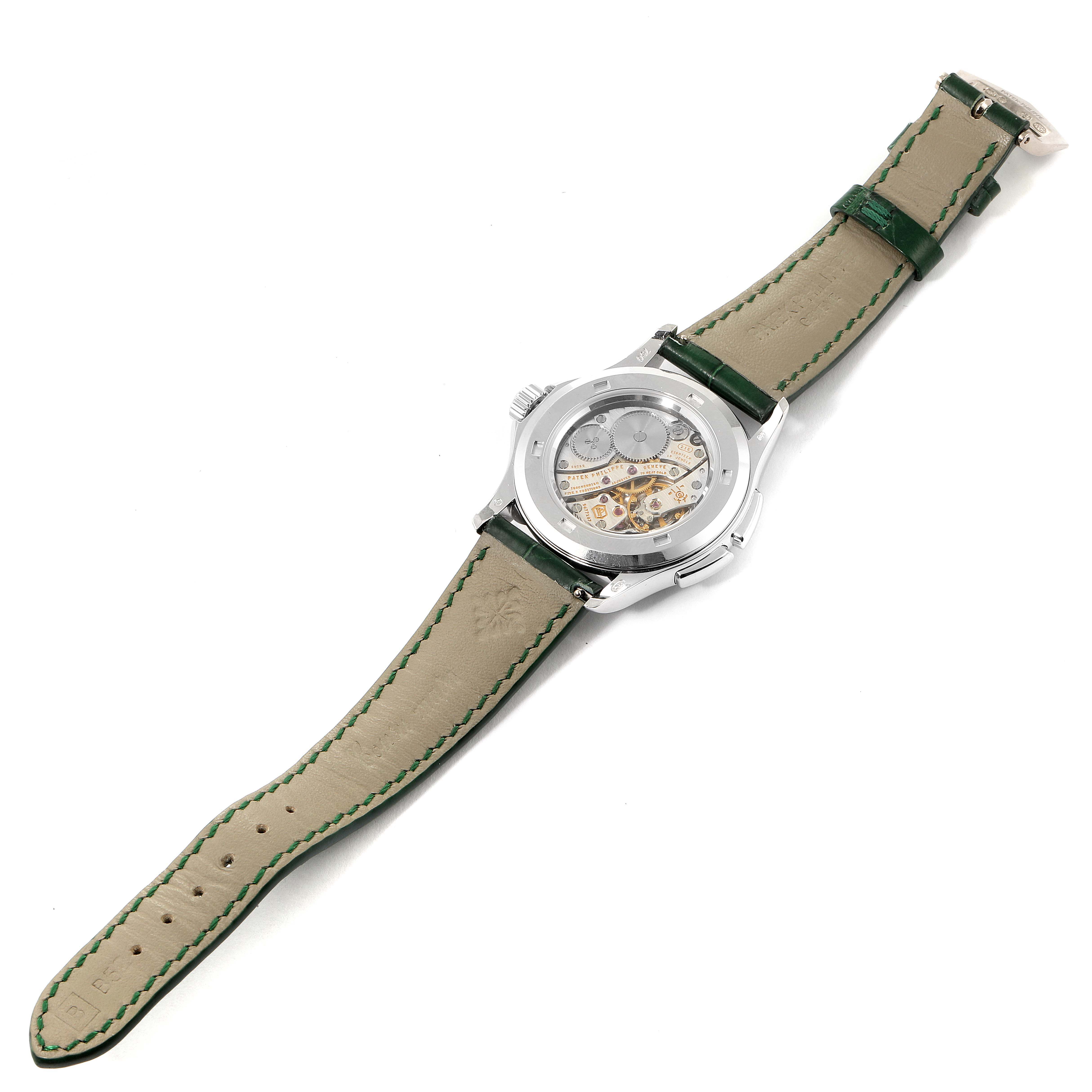 This image shows the Patek Philippe Calatrava 4934G Women's White Gold Mother of Pearl Dial 4934G Women's White Gold Mother of Pearl Dial model watch from the rear angle, displaying the movement and leather strap.