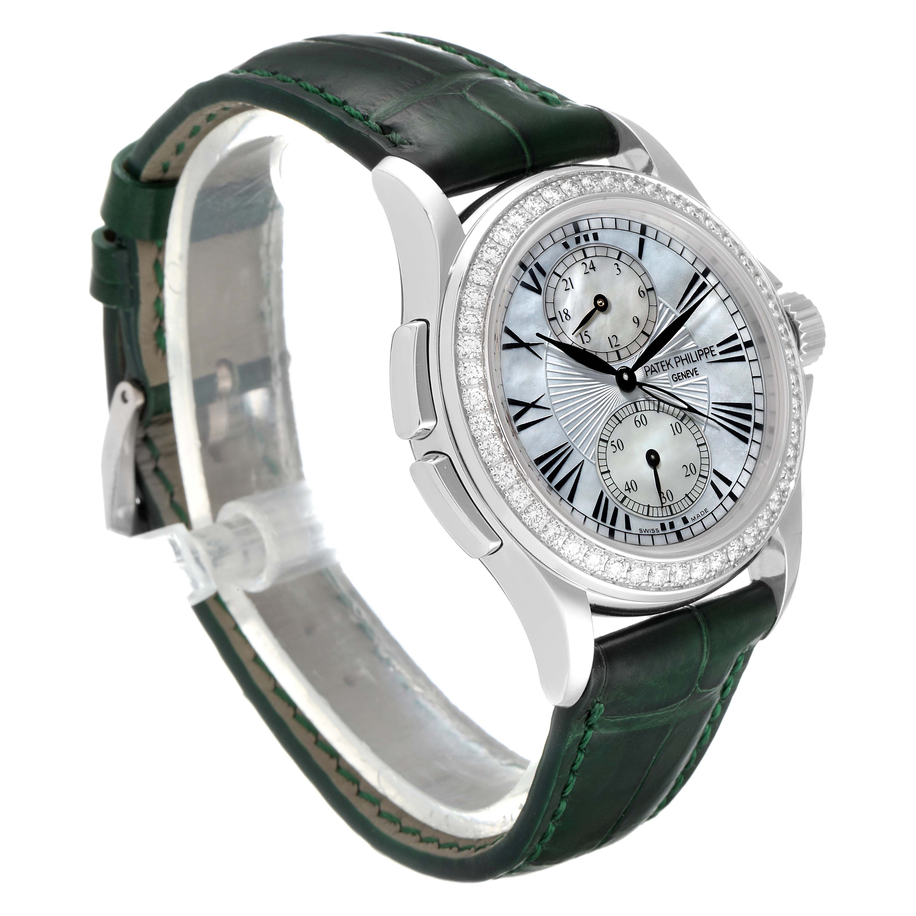 This image shows a Patek Philippe Calatrava 4934G Women's White Gold Mother of Pearl Dial 4934G Women's White Gold Mother of Pearl Dial watch at a slight side angle, highlighting its dial, case, and green leather strap.