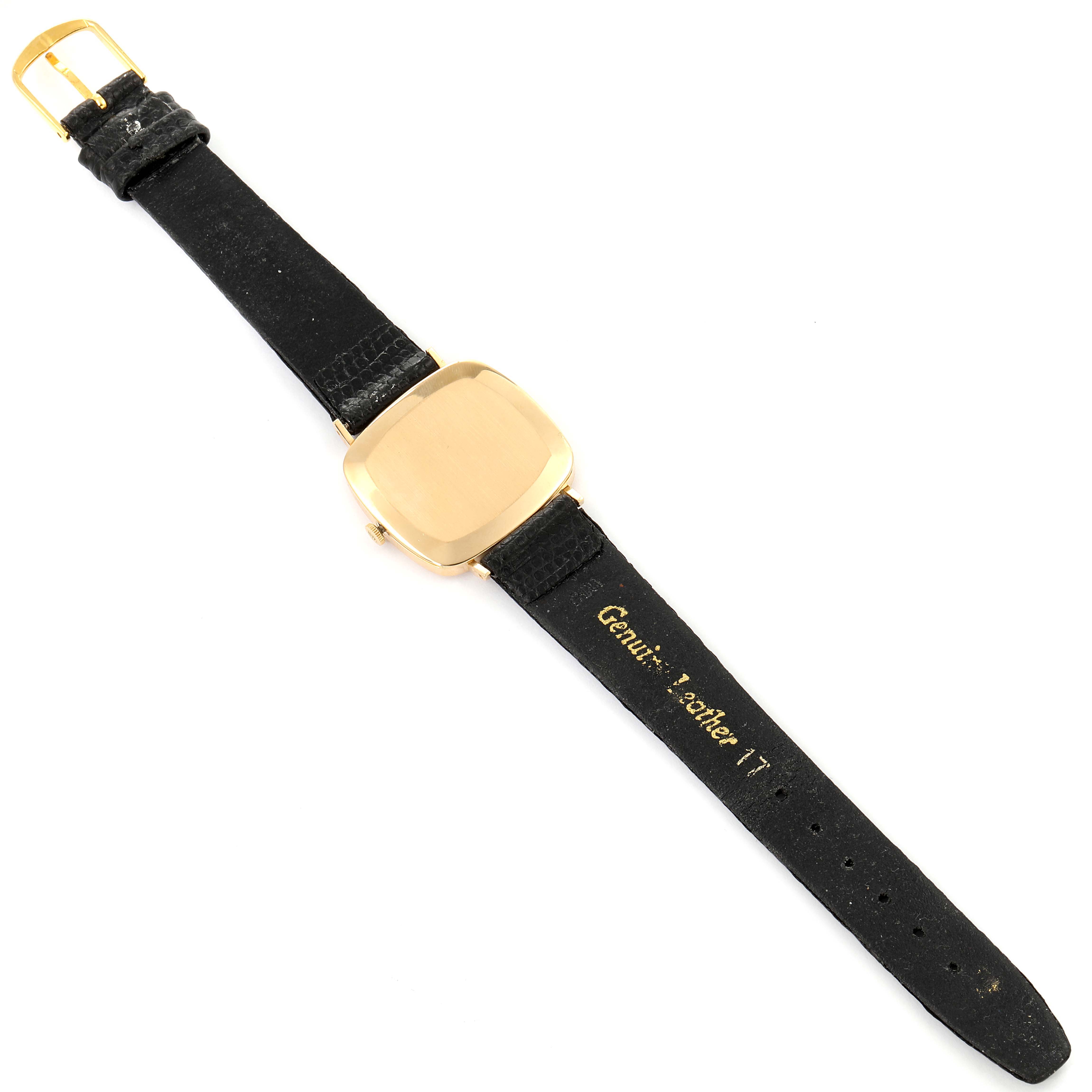 This image shows the back case and full black leather strap of a Rolex Cellini 4084 Men's Yellow Gold Champagne Dial 4084 Men's Yellow Gold Champagne Dial watch, viewed from a top-down angle.