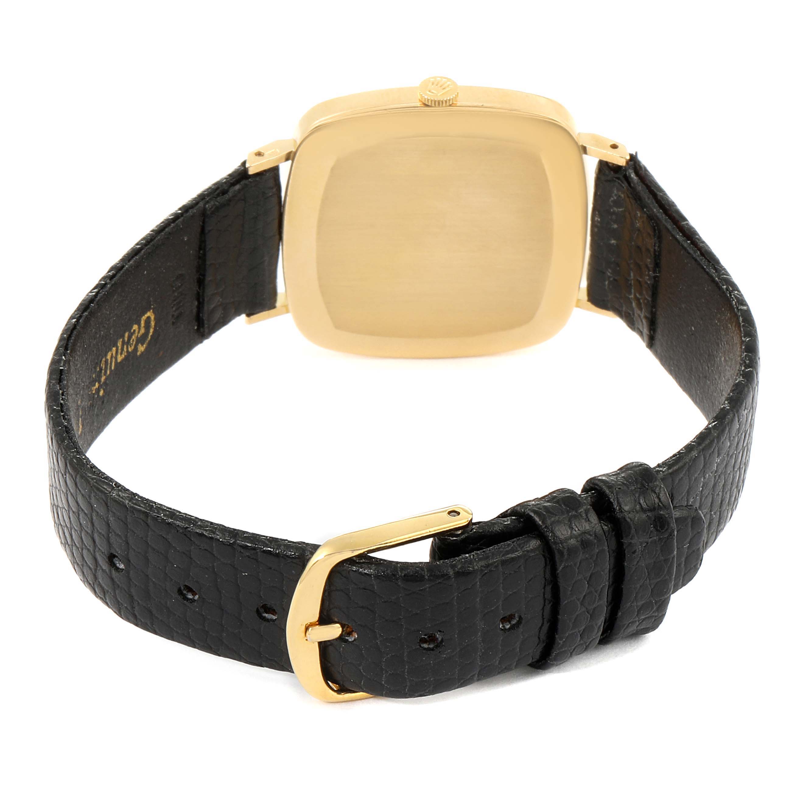 This image shows the back and strap of a Rolex Cellini 4084 Men's Yellow Gold Champagne Dial 4084 Men's Yellow Gold Champagne Dial watch, focusing on the gold case and black leather strap with a gold buckle.