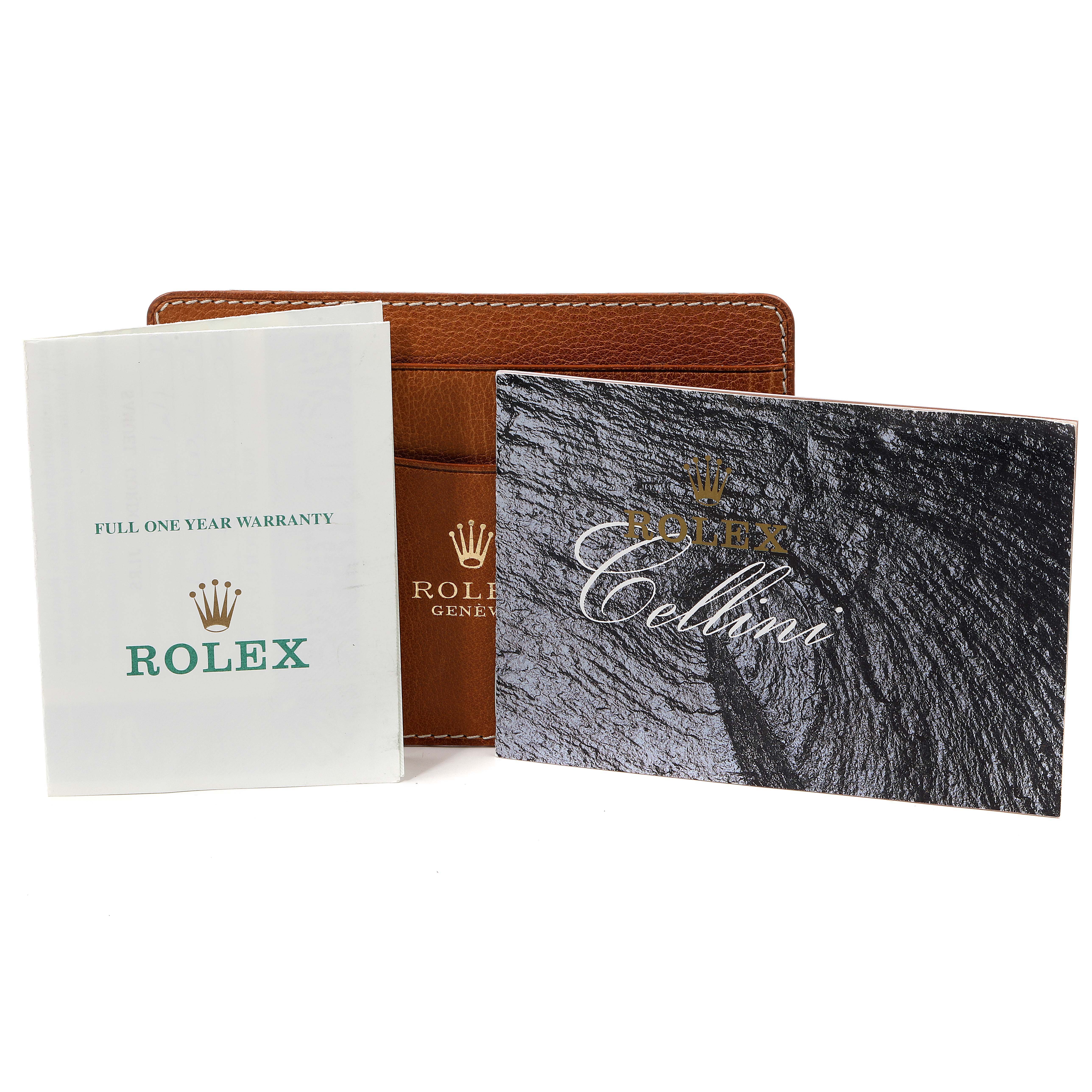 The image shows the full one-year warranty booklet, a Rolex Cellini 4135 Men's Yellow Gold Champagne Dial 4135 Men's Yellow Gold Champagne Dial booklet, and a brown leather cardholder for a Rolex Cellini 4135 Men's Yellow Gold Champagne Dial 4135 Men's Yellow Gold Champagne Dial watch.