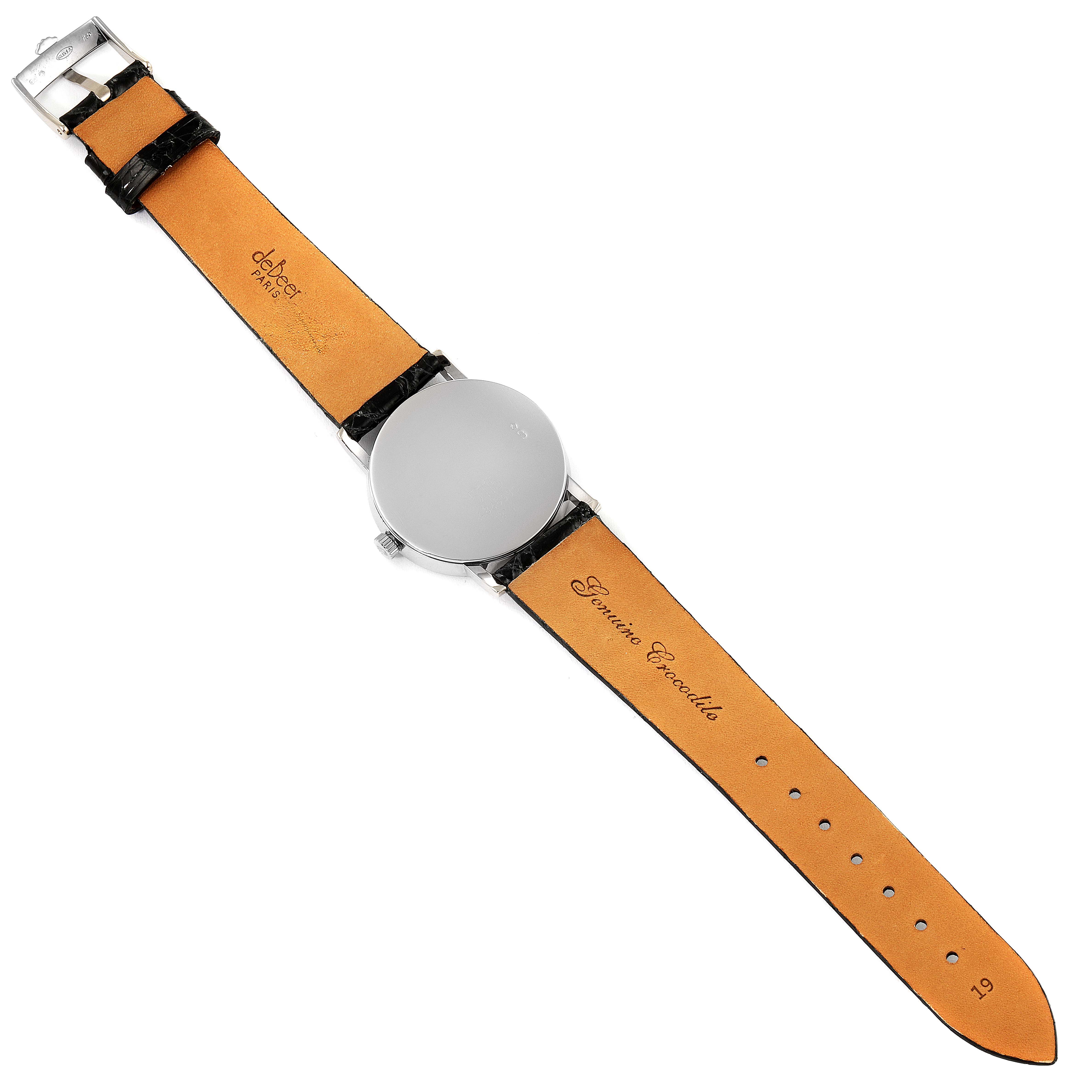 The image shows the back of a Rolex Cellini 5115 Men's White Gold Black Dial 5115 Men's White Gold Black Dial watch, highlighting its leather strap and case back from a top-down view.