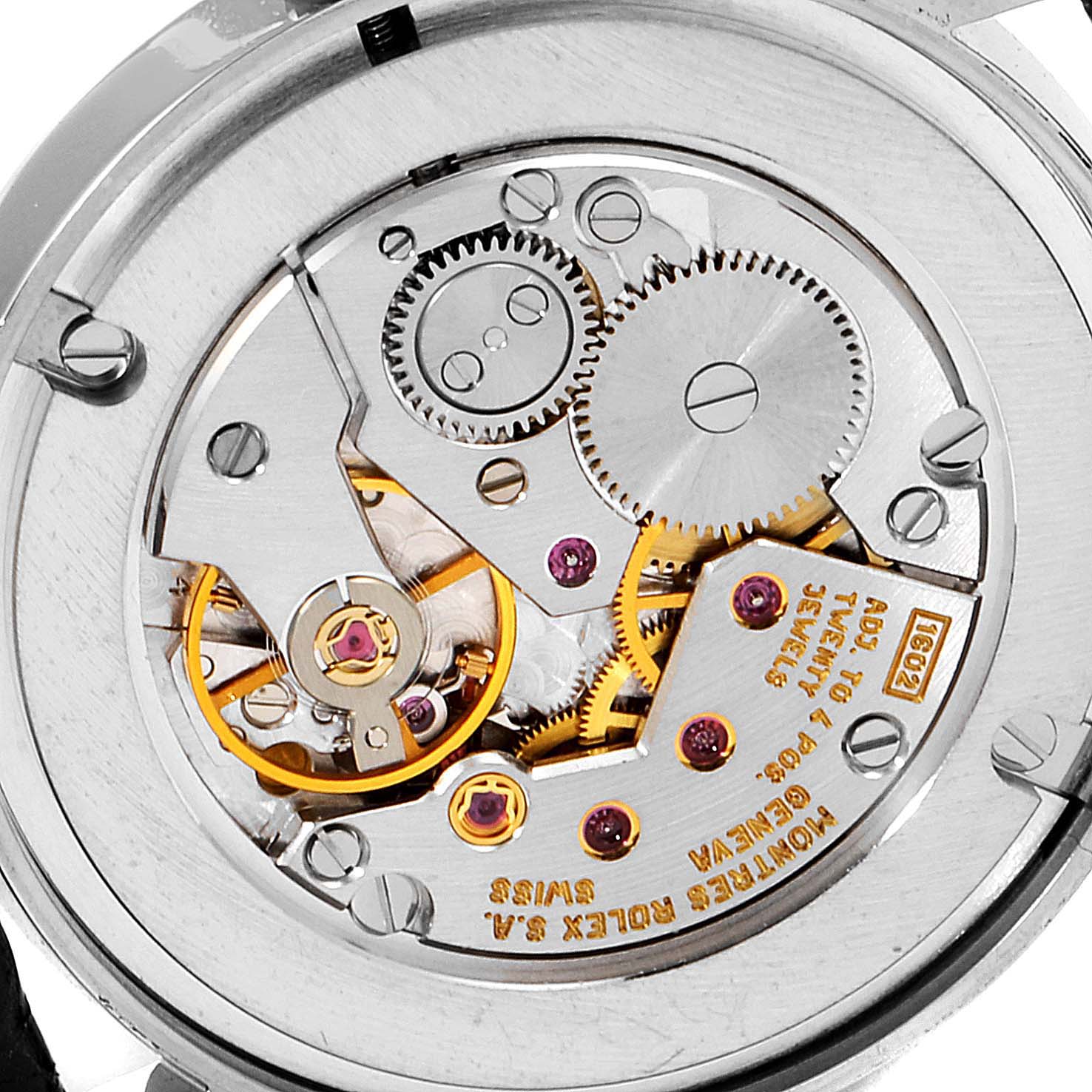 The image shows the intricate movement and gears of the Rolex Cellini 5115 Men's White Gold Black Dial 5115 Men's White Gold Black Dial model from a back case angle.