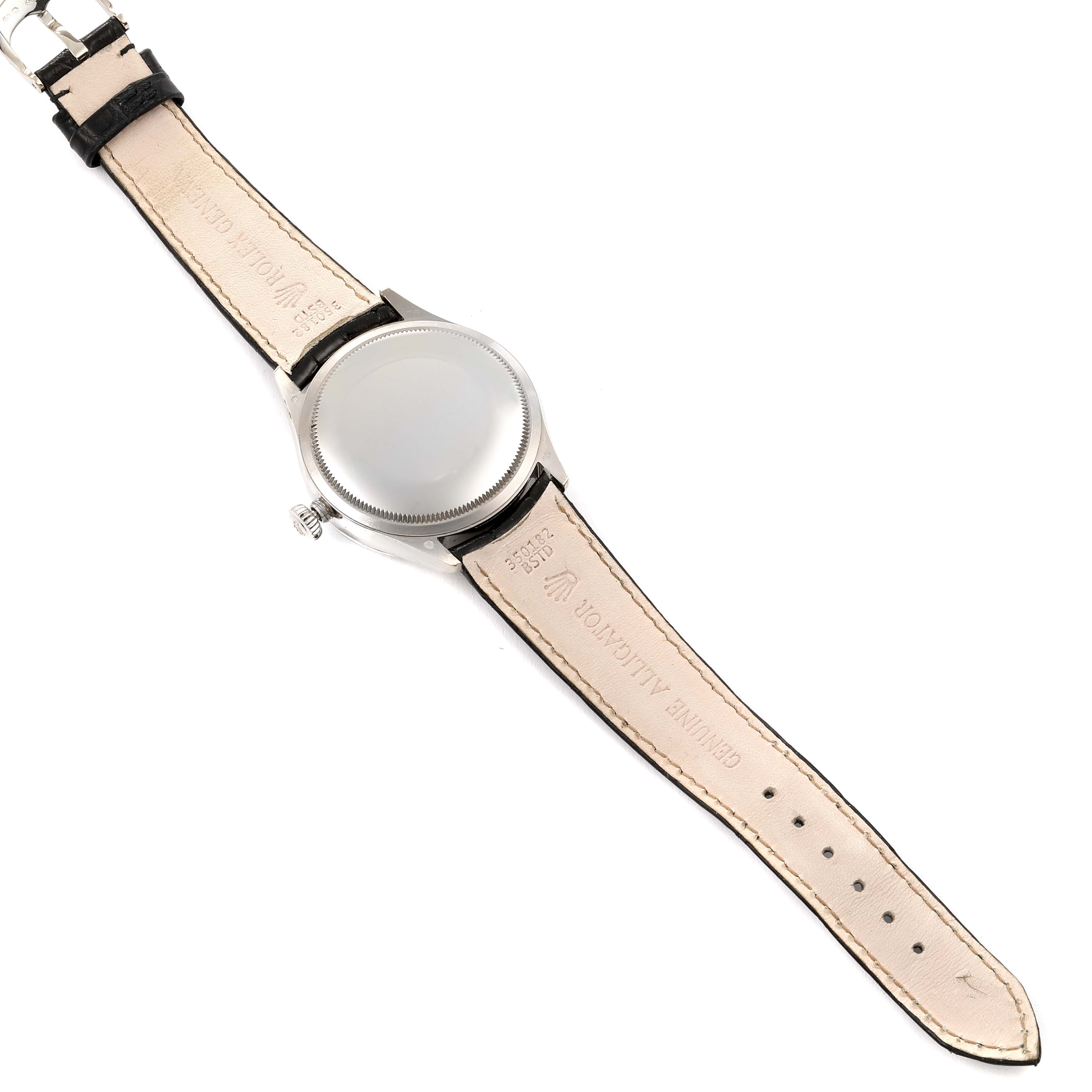 The image shows the back of a Rolex Cellini 50519 Men's White Gold Black Dial 50519 Men's White Gold Black Dial watch with its leather strap and metal case.