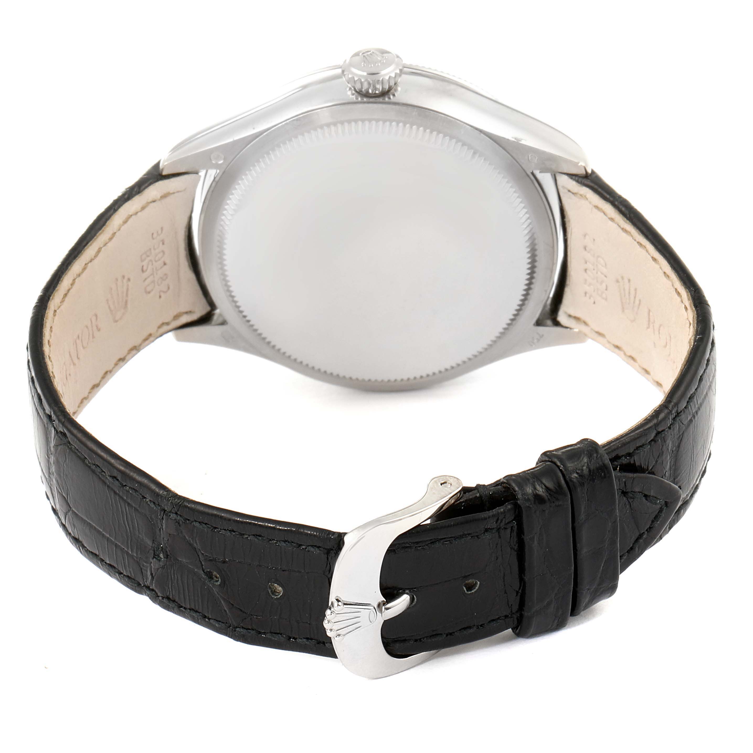 The image shows the back case and leather strap with buckle of the Rolex Cellini 50519 Men's White Gold Black Dial 50519 Men's White Gold Black Dial watch.