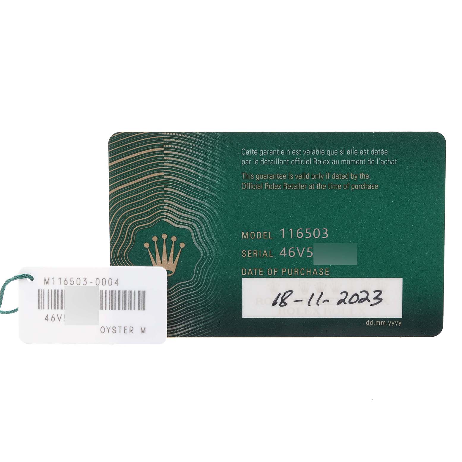 This image shows the warranty card and tag for a Rolex Daytona 116503 Men
s Steel and Gold (two tone) Black Dial 116503 Men
s Steel and Gold (two tone) Black Dial model 116503.