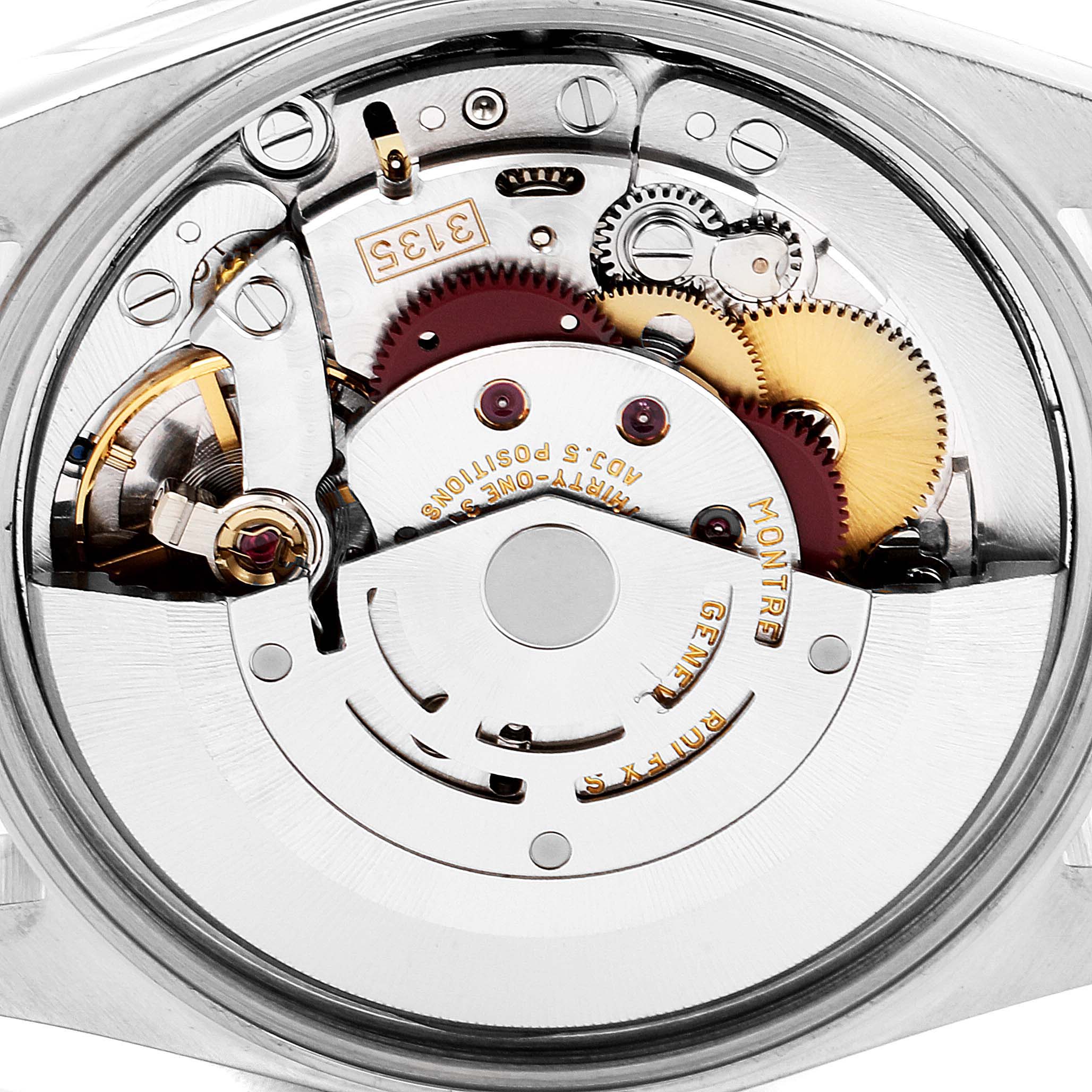 This image shows the intricate internal movement mechanism and gears of a Rolex Date 15210 Men's Stainless Steel Black Dial 15210 Men's Stainless Steel Black Dial model watch.