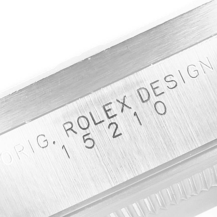 The image shows a close-up of the case side engraving on the Rolex Date 15210 Men's Stainless Steel Black Dial 15210 Men's Stainless Steel Black Dial model, highlighting its model number.