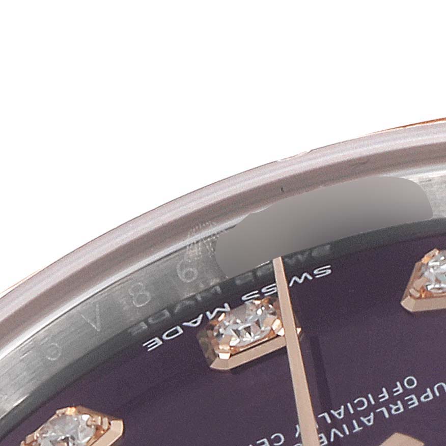 The close-up image shows part of the dial and diamond hour markers of a Rolex Datejust 279381 Women's Steel and Gold (two tone) Blue Dial 279381 Women's Steel and Gold (two tone) Blue Dial model watch.