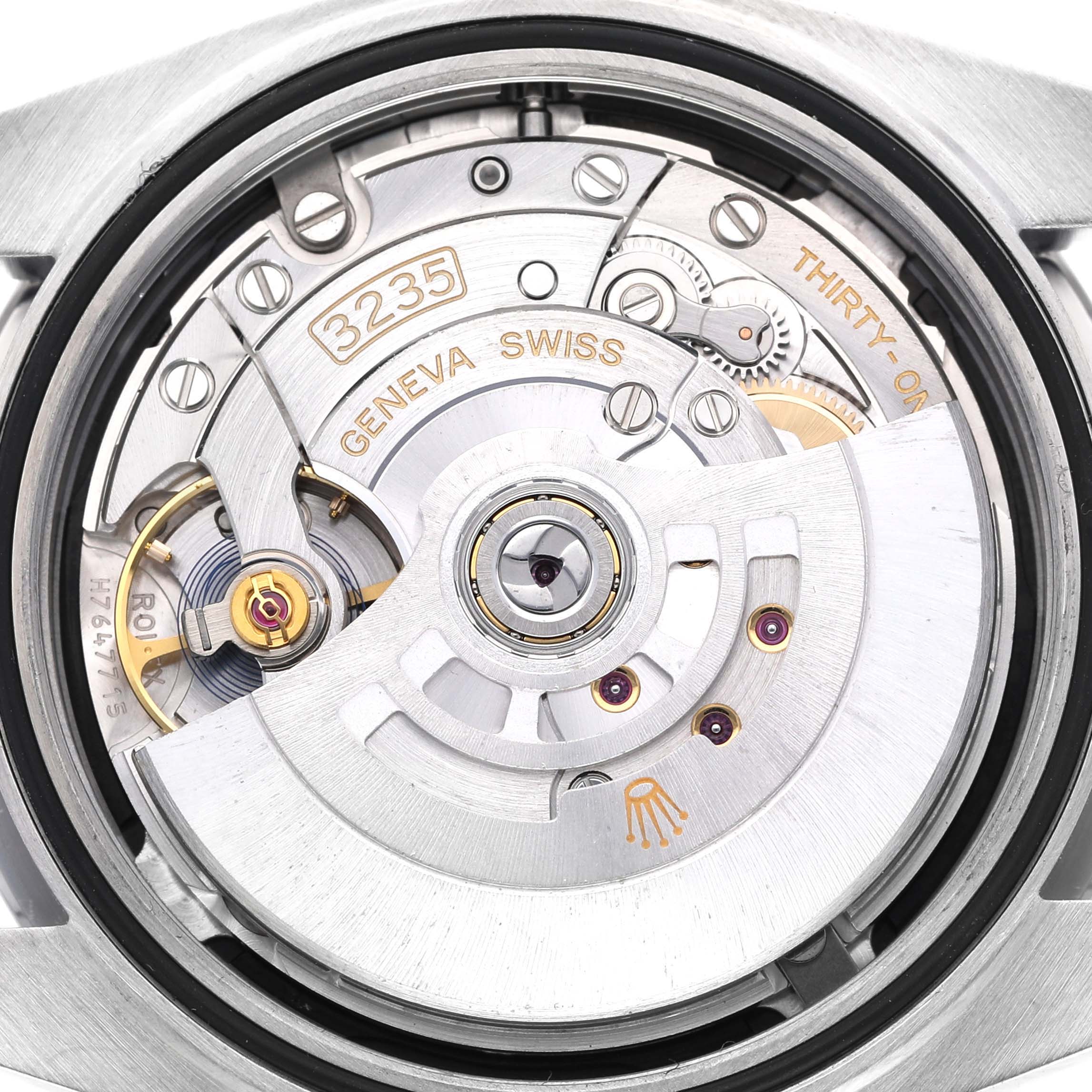 The image shows the movement and internal mechanics of the Rolex Datejust 41 126300 Men's Stainless Steel Black Dial, viewed from the back.