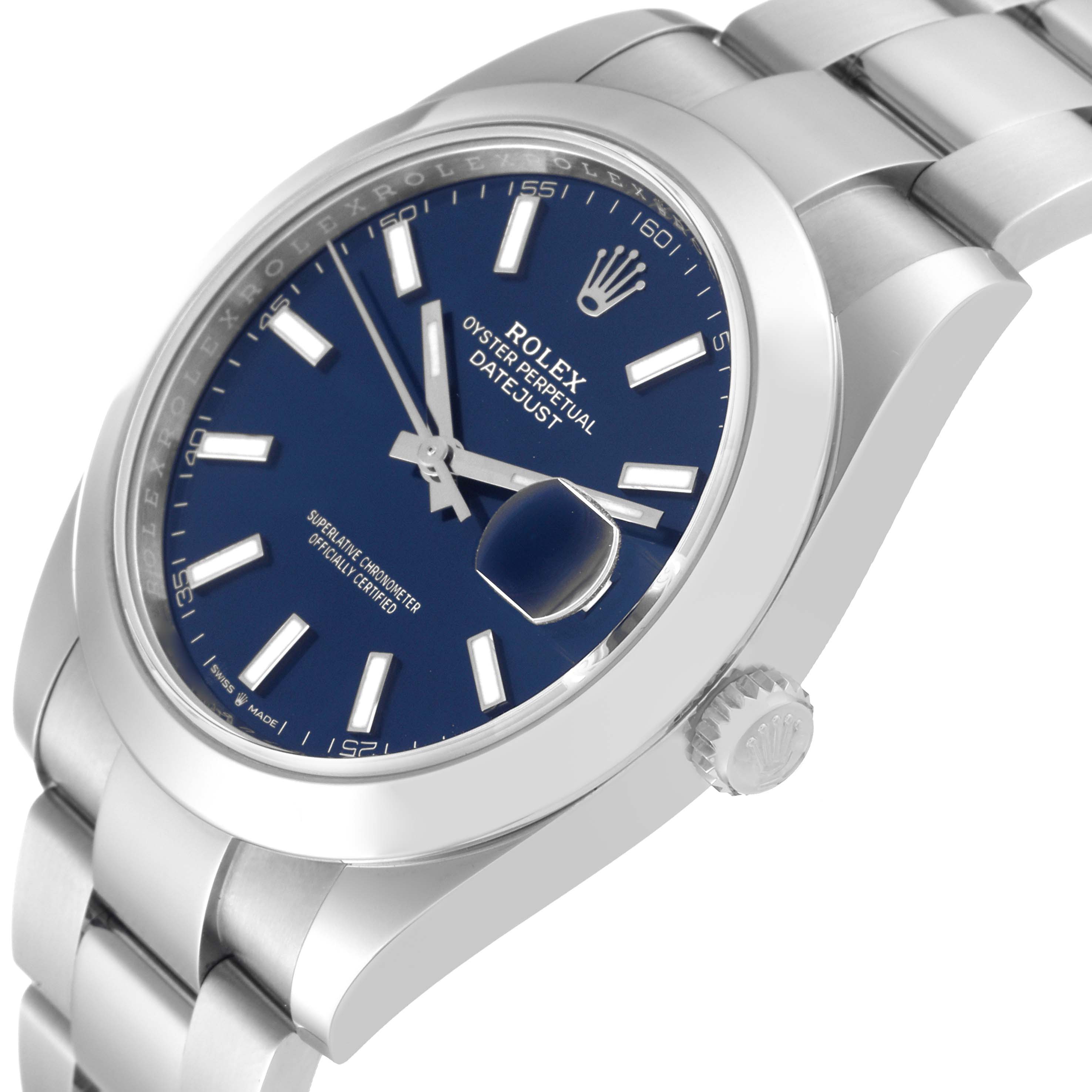 The image shows a close-up of a Rolex Datejust 41 126300 Men
s Stainless Steel Blue Dial 126300 Men
s Stainless Steel Blue Dial watch, highlighting the dial, bezel, crown, and part of the bracelet.