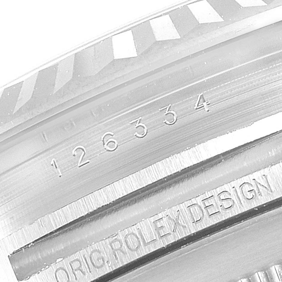 This is a close-up angle showing the serial number and engraving on the bezel of the Rolex Datejust 41 126334 Men's Stainless Steel Blue Dial 126334 Men's Stainless Steel Blue Dial watch.