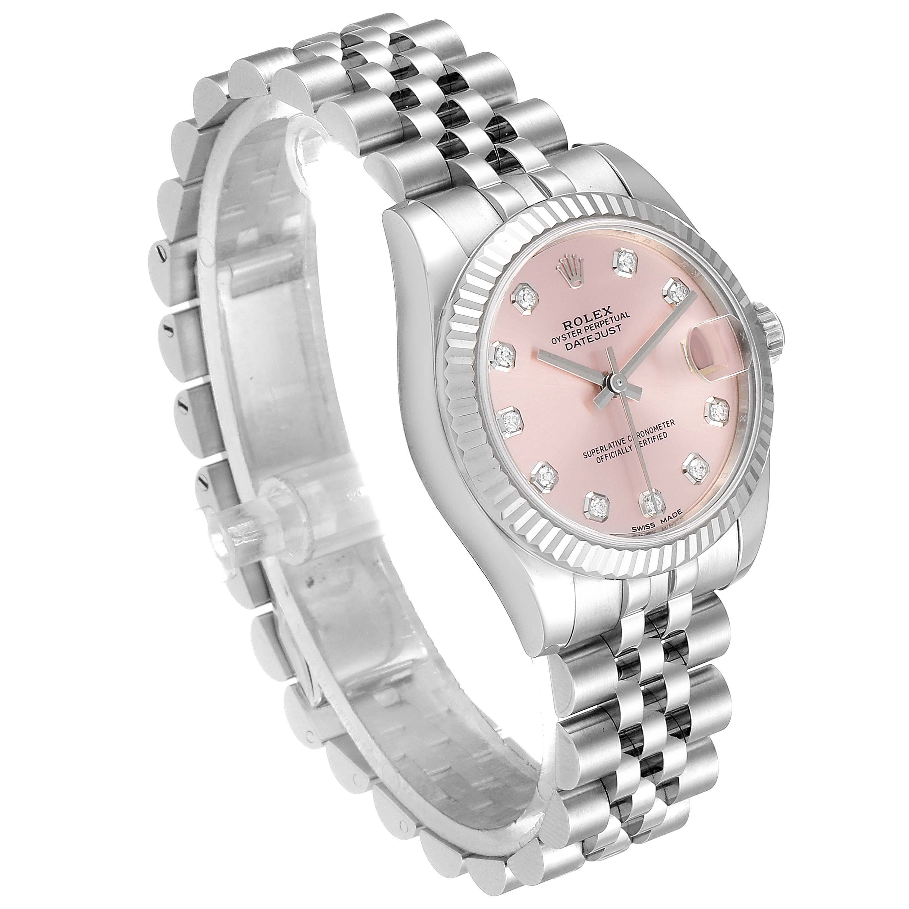 The image shows a Mid-Size Rolex Datejust watch from a front angle, highlighting its dial, bezel, and bracelet.