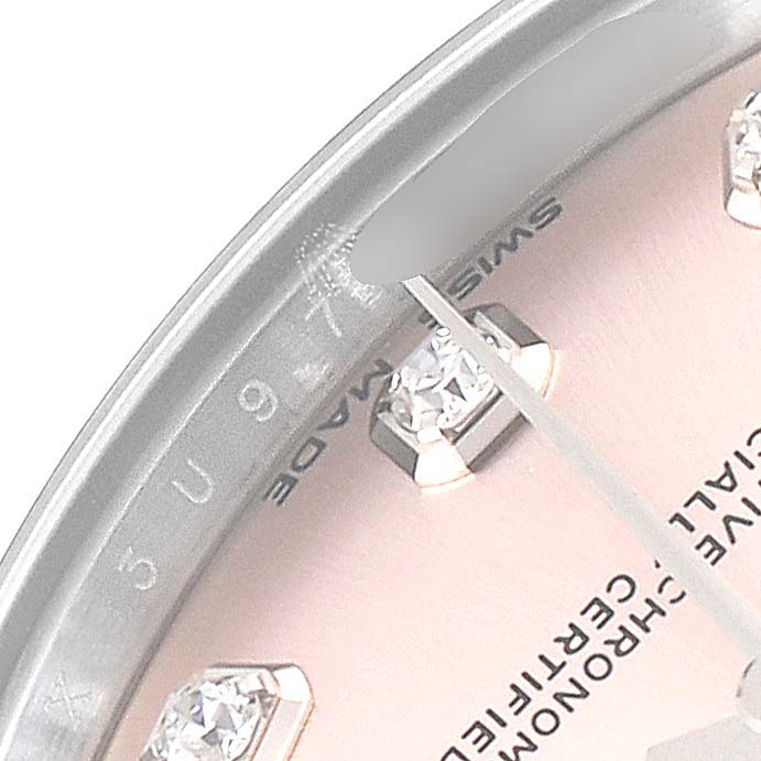 The image shows a close-up view of the dial, indices, and part of the bezel of the Rolex Mid-Size 178274 Women's Stainless Steel Pink Dial 178274 Women's Stainless Steel Pink Dial model watch.