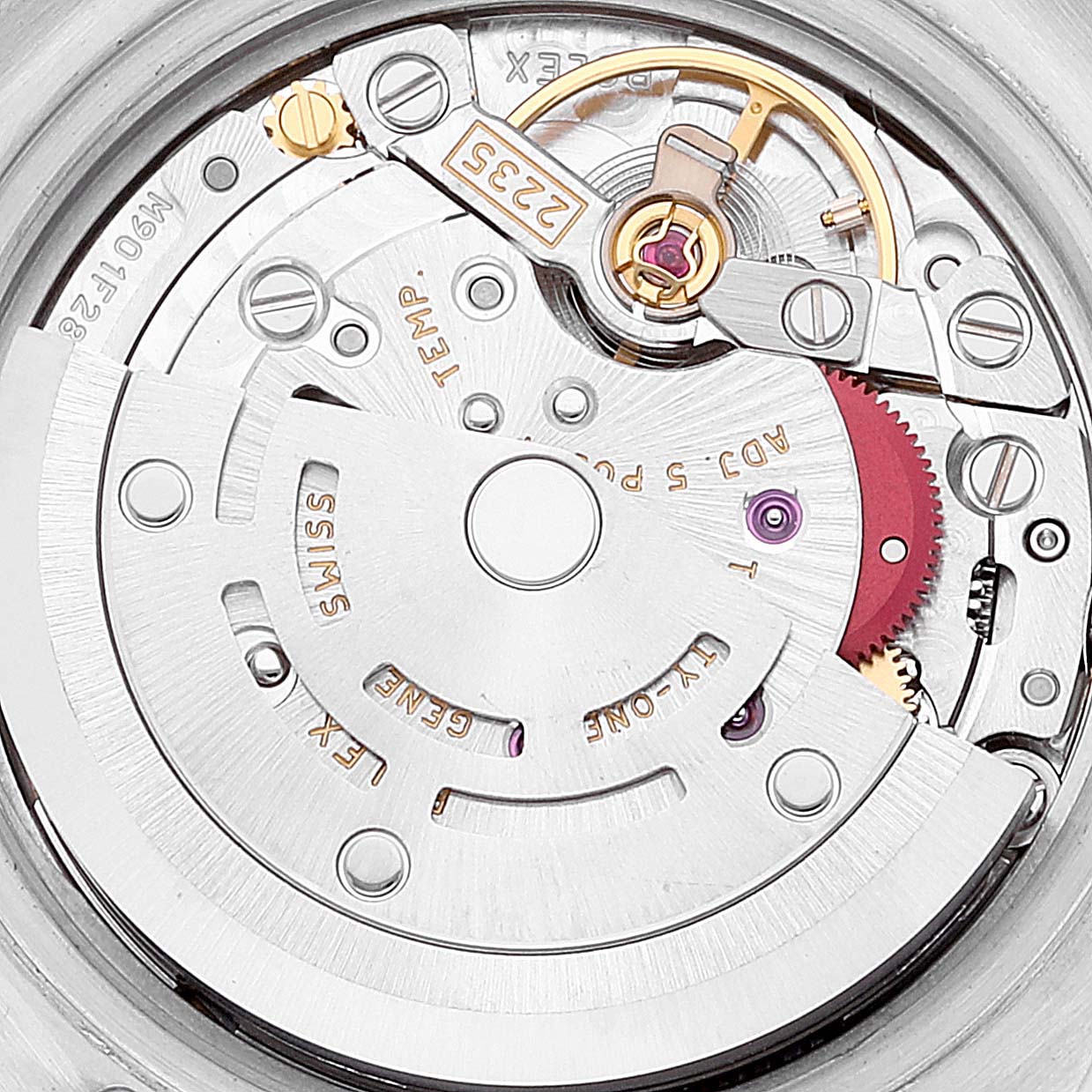 The image shows a close-up view of the inner mechanism of a Rolex Datejust 179174 Women's Stainless Steel Mother of Pearl Dial 179174 Women's Stainless Steel Mother of Pearl Dial watch, highlighting gears and movement components.