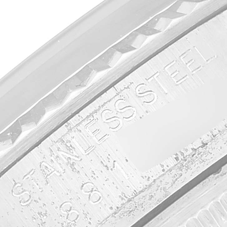 This image shows a close-up of the stainless steel engraving on the Rolex Datejust 16014 Men's Stainless Steel White Dial 16014 Men's Stainless Steel White Dial watch.