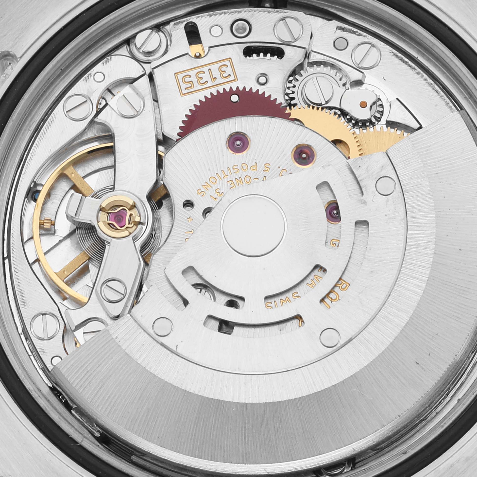 The image shows the intricate inner mechanism of the Rolex Turn-o-Graph 116261 Men's Steel and Gold (two tone) Black Dial 116261 Men's Steel and Gold (two tone) Black Dial watch from a close-up angle, showcasing its gears and components.