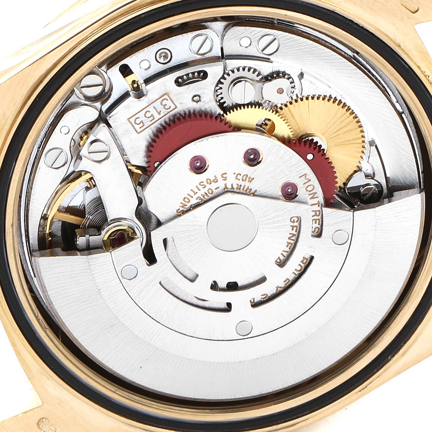 The image shows the Rolex President 1989-1990 Men
s Yellow Gold Champagne Dial 1989-1990 Men
s Yellow Gold Champagne Dial model watch from the back, displaying its intricate internal mechanical movement.
