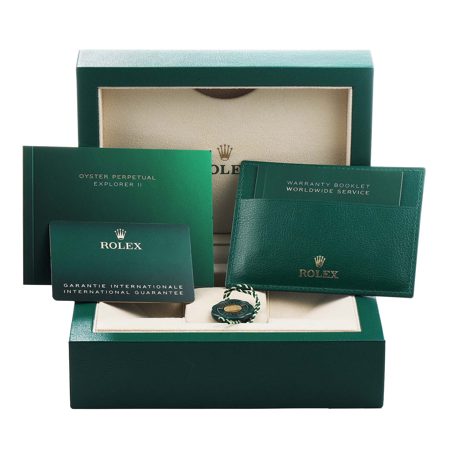 The image displays the packaging and accessories for a Rolex Explorer 226570 Men's Stainless Steel Black Dial, including a box, warranty booklet, and other documents.