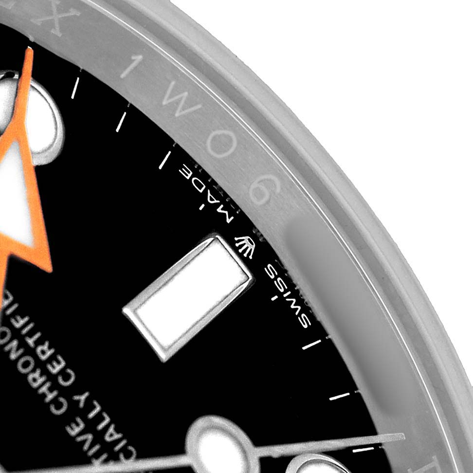 The image shows a close-up of the dial and bezel of a Rolex Explorer 226570 Men's Stainless Steel Black Dial watch, highlighting the hour markers and part of the hand.