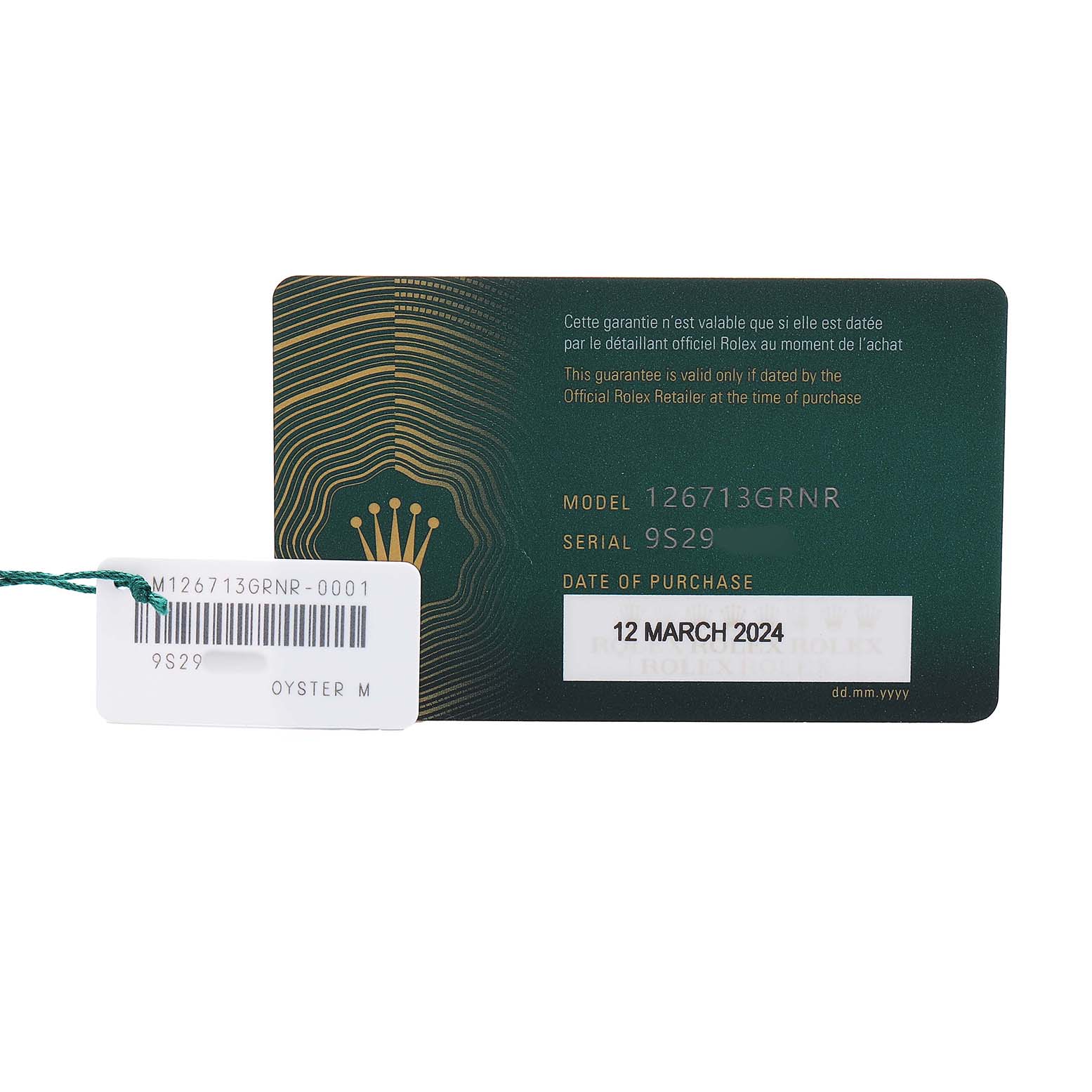 The image shows a Rolex GMT-Master 126713 Men's Steel and Gold (two tone) Black Dial 126713GRNR warranty card with tag, displaying model and serial numbers.