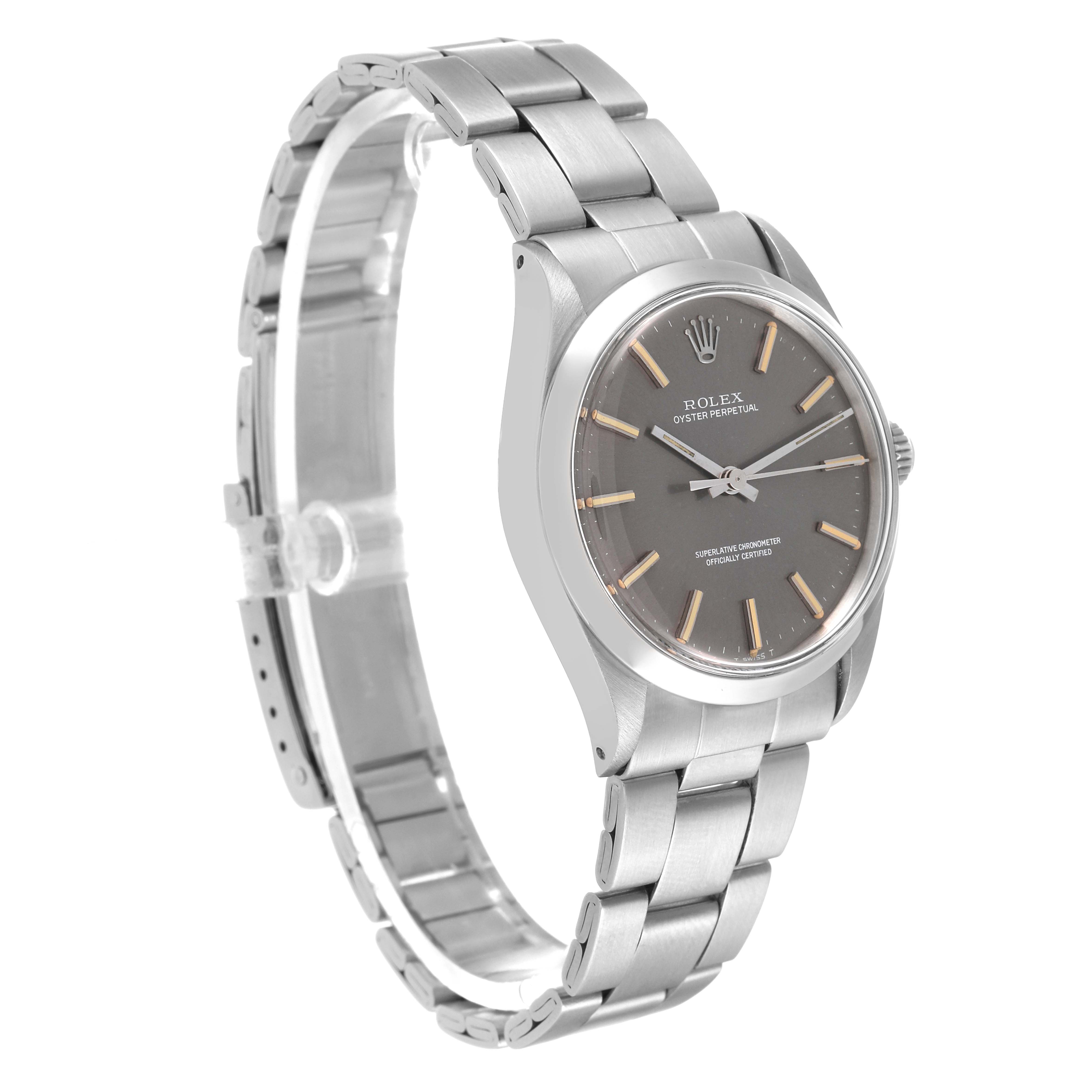 The Rolex Oyster Perpetual 1002 Men's Stainless Steel Grey Dial 1002 Men's Stainless Steel Grey Dial model watch is shown at a three-quarter view angle, featuring its face, bezel, and metal bracelet.