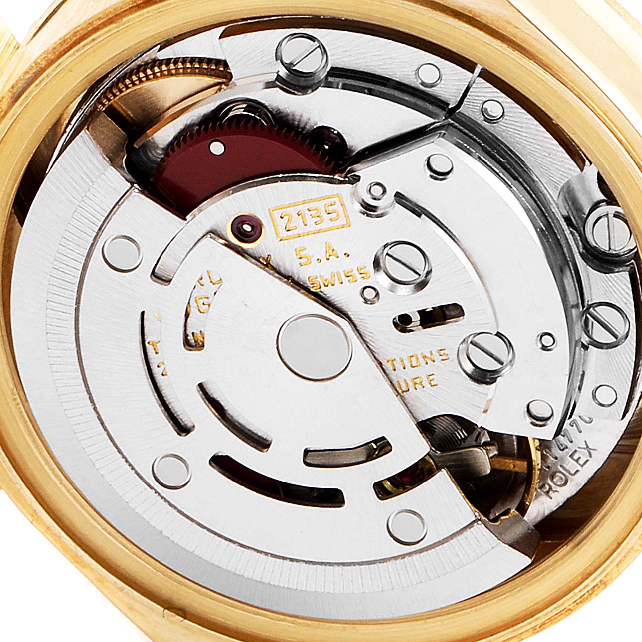 This image shows the intricate internal mechanics of a Rolex President 69278 Women
s Yellow Gold Champagne Dial 69278 Women
s Yellow Gold Champagne Dial model watch, focused on its movement components.