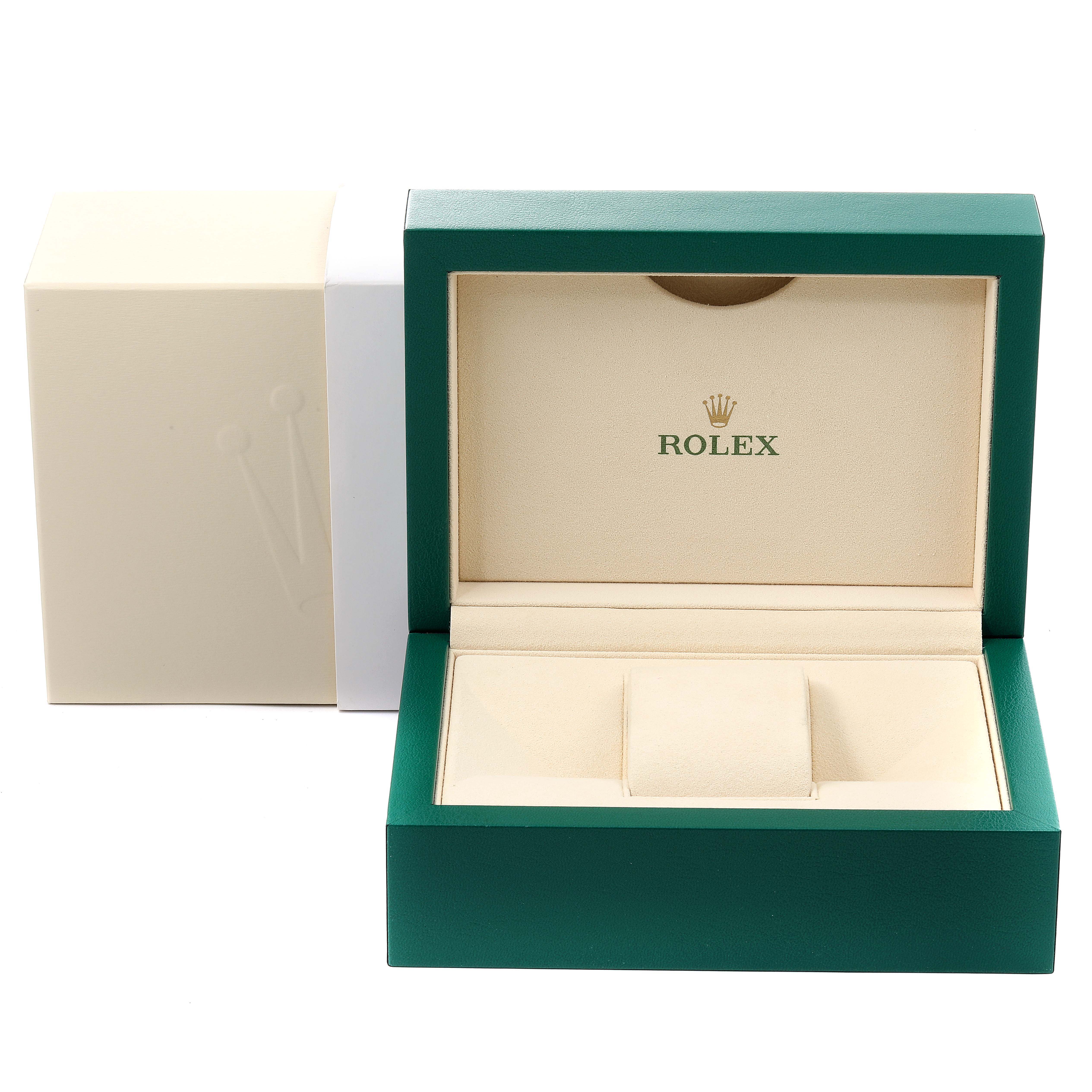 This image shows an open green Rolex Submariner 16613 Men's Steel and Gold (two tone) Black Dial 16613 Men's Steel and Gold (two tone) Black Dial watch box with its beige interior.