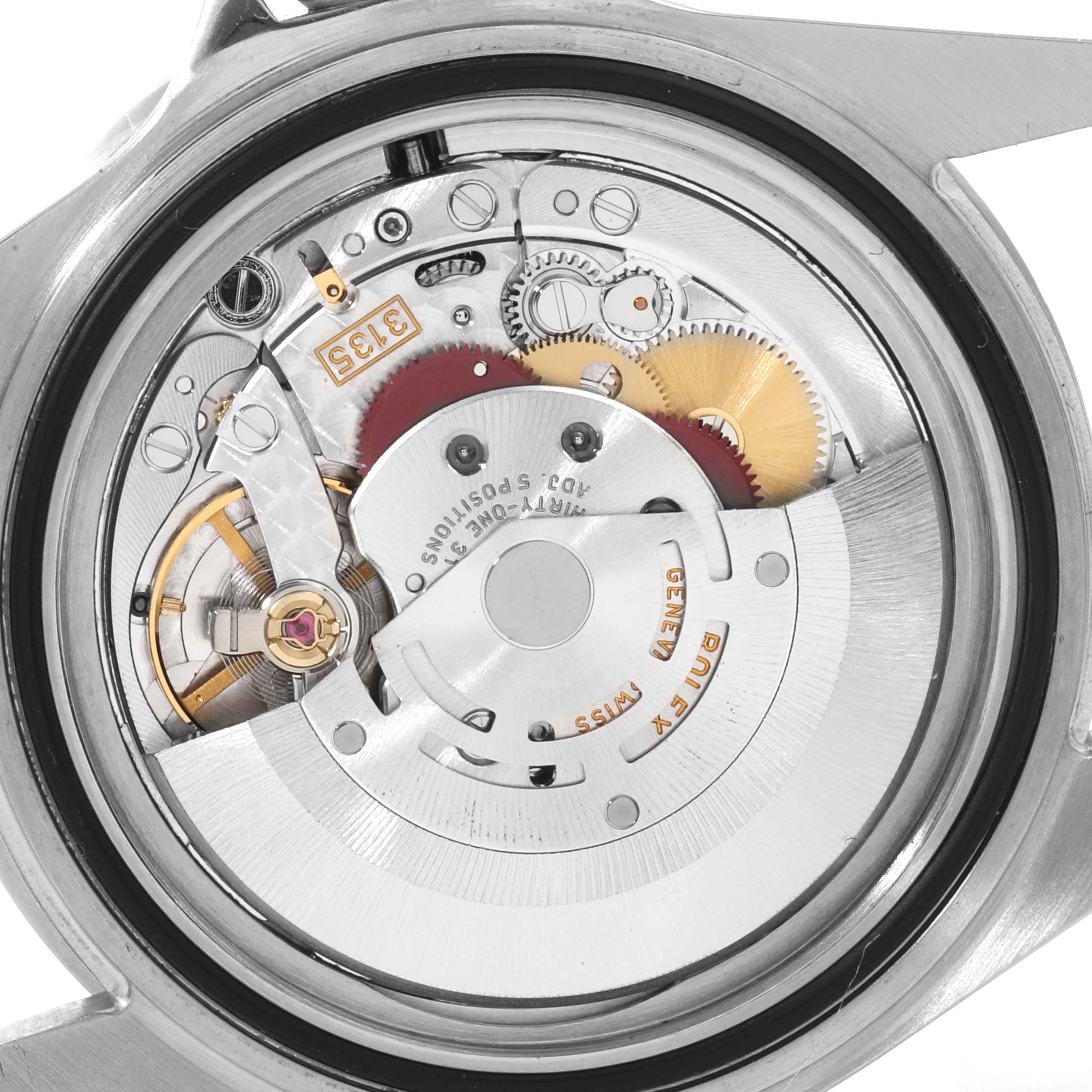 This image shows the internal mechanism and movement of the Rolex Submariner 16610LV Men
s Stainless Steel Black Dial 16610LV Men
s Stainless Steel Black Dial watch from a rear angle.